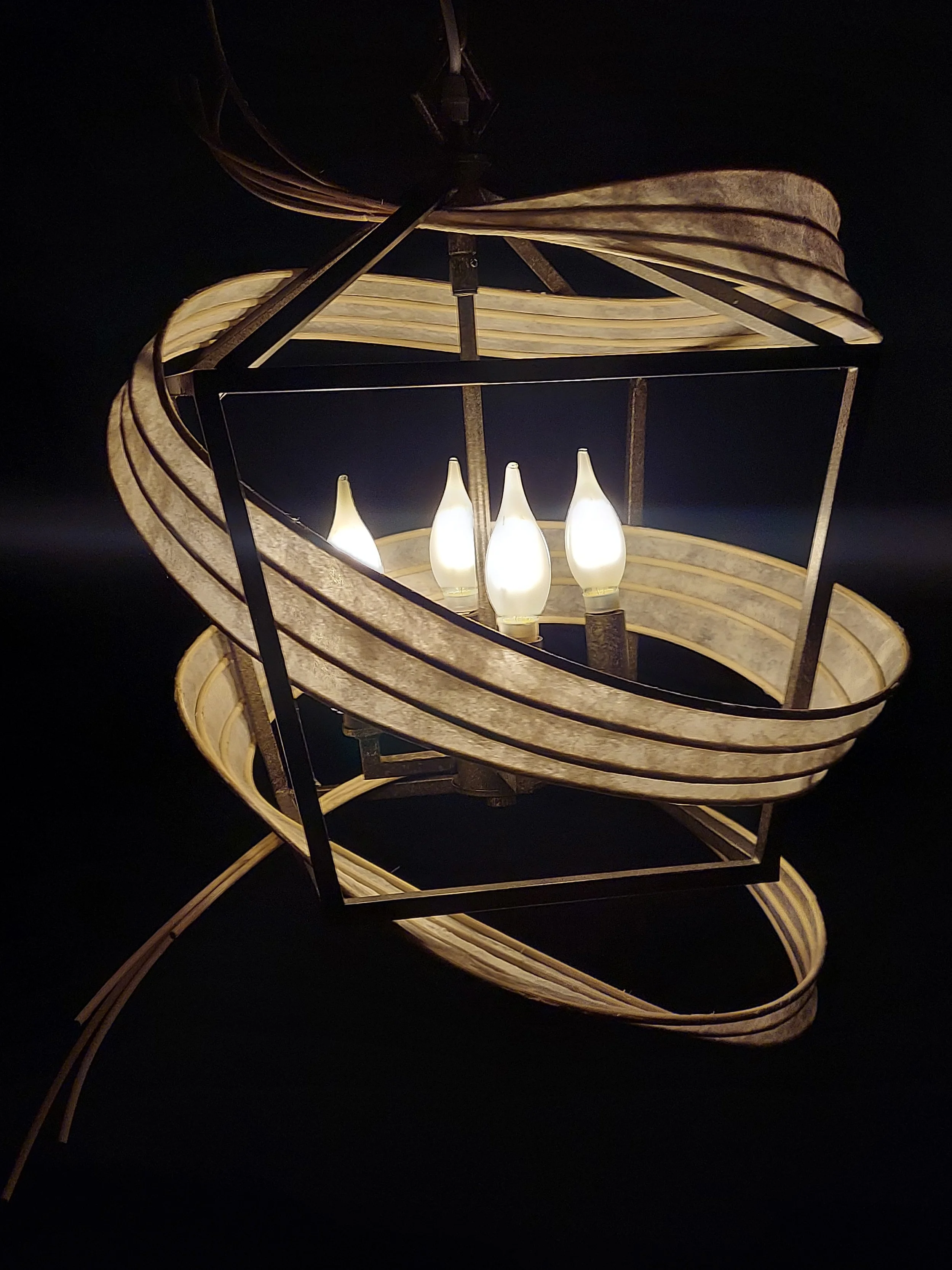 Pendent light sculpture candelabra made from upcycled lamp and paper and reed.