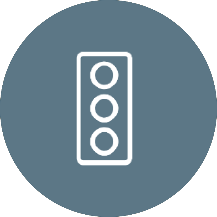 Icon of a traffic light with three circles inside a rounded rectangle.