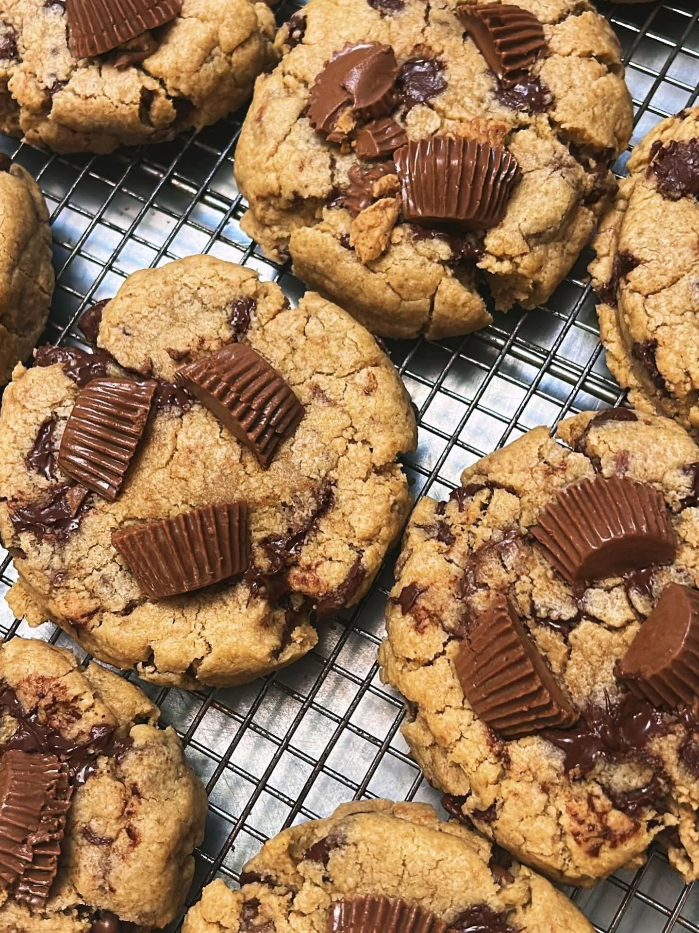 Attention all peanut butter and chocolate lovers 📣 
Do not miss out on our new Peanut Butter Chocolate Chip cookie! 

Peanut butter base with chocolate chips and Reese&rsquo;s cups, topped with even more Reese&rsquo;s🍪