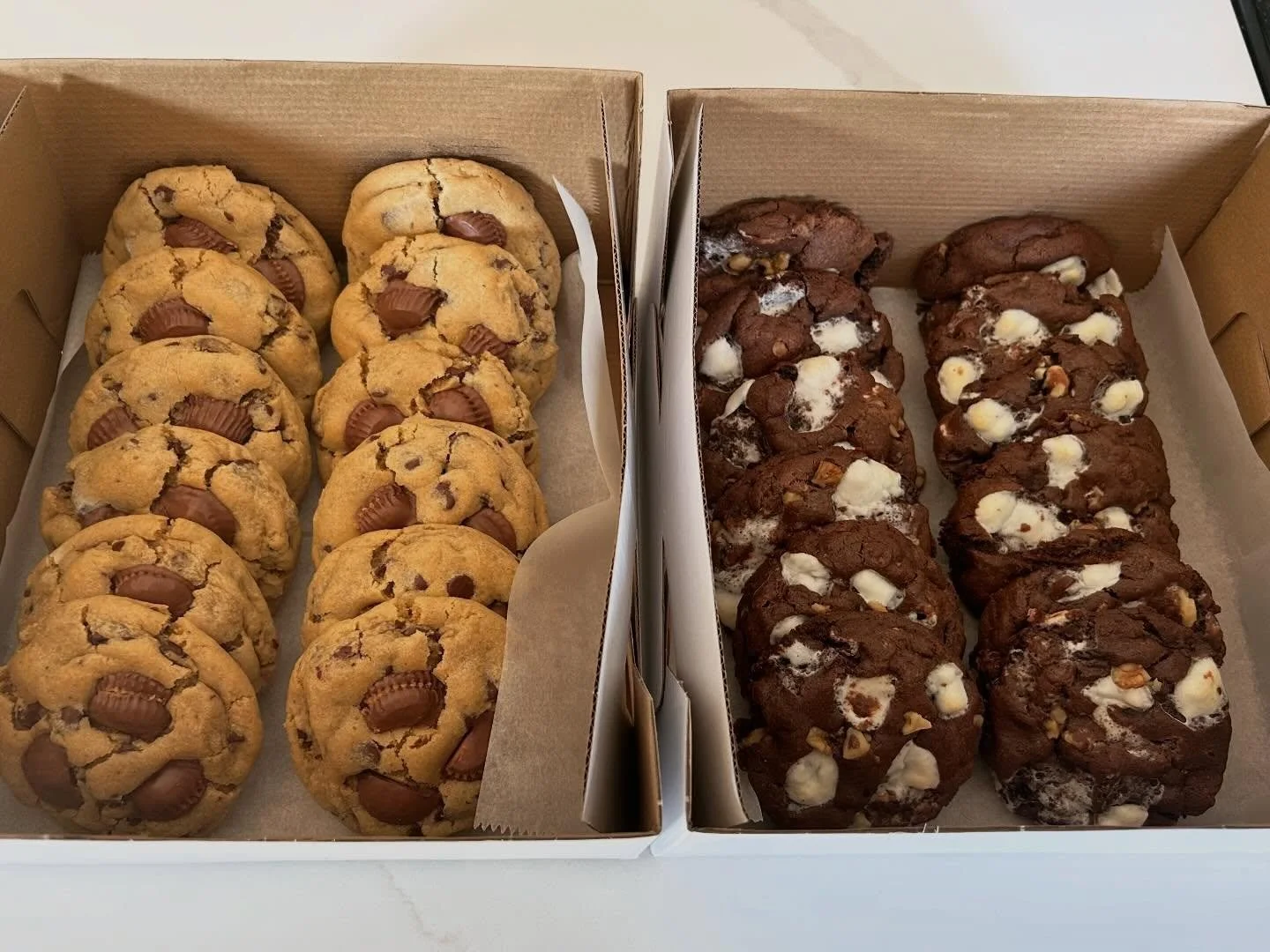 10 dozen cookies baked, boxed, and ready to be enjoyed! 🍪🎁 We are so excited to be able to cater events in our local community. 

Featuring: Peanut Butter Chocolate Chip, Rocky Road, Birthday Cake Confetti, S&rsquo;mores, Double Chocolate Chip, Hal