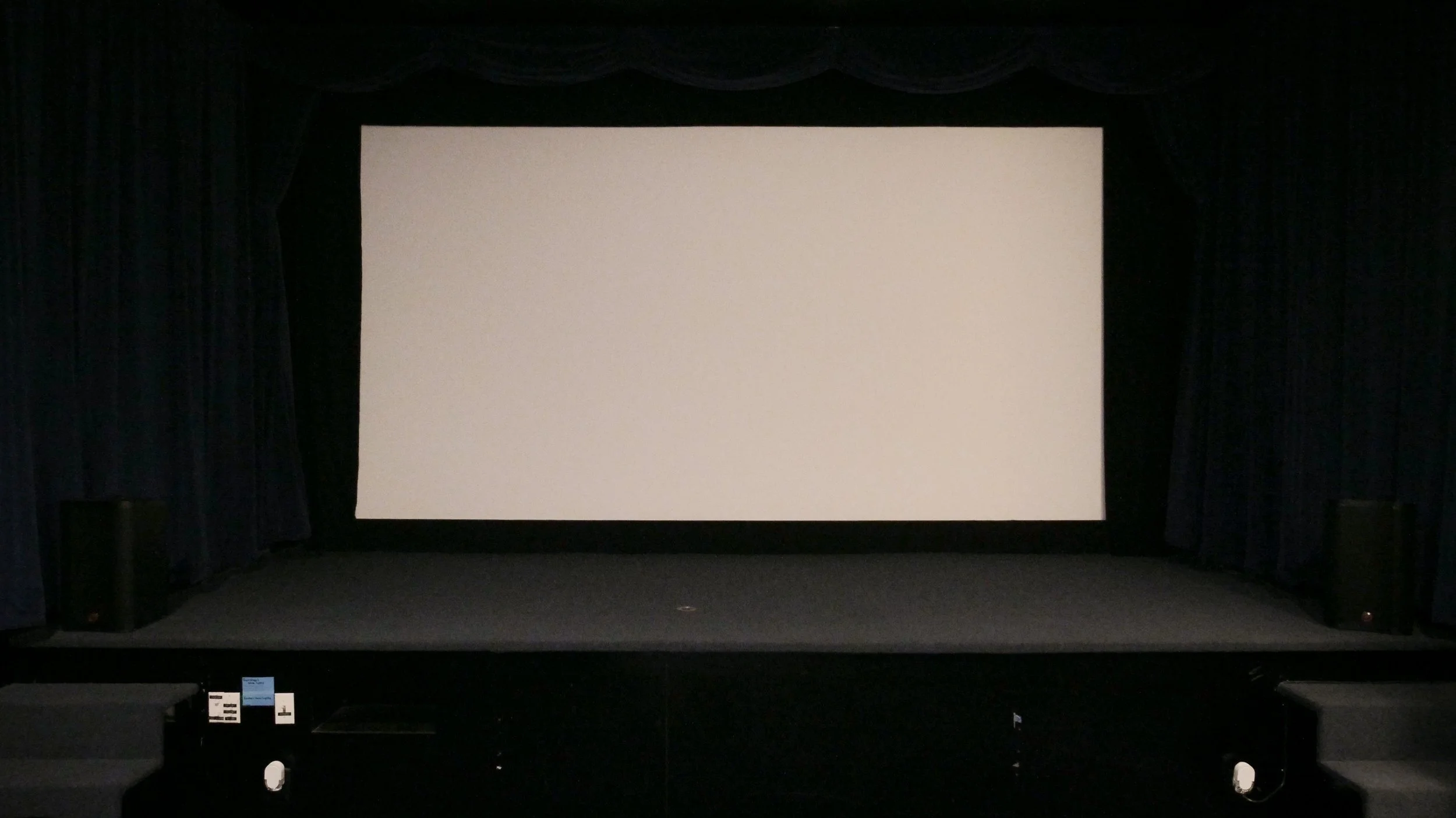 Screen and stage: 18' screen, stage accessible by stairs. 