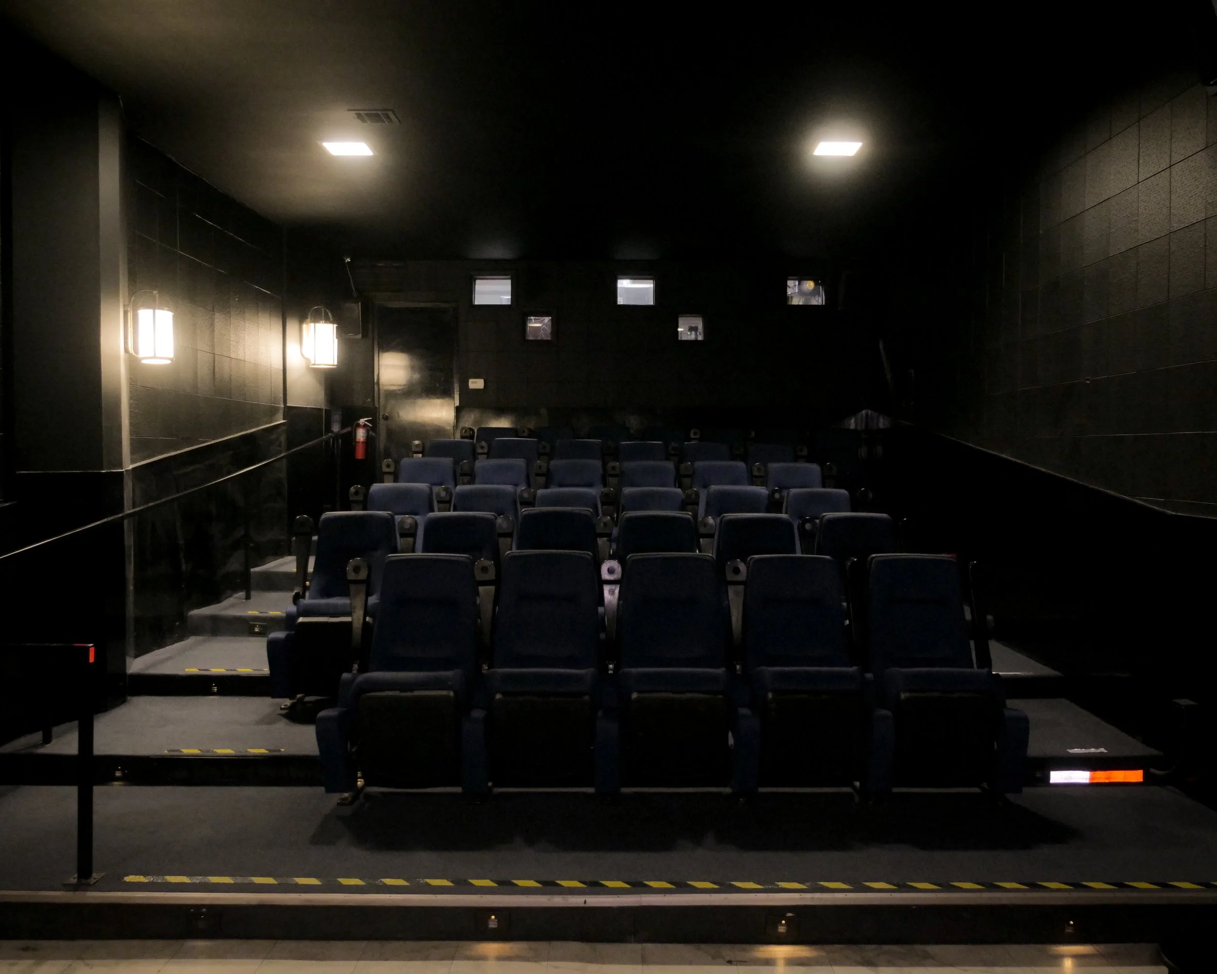 Upper section: 36 stadium seats (non-removable), available only by stairs. 