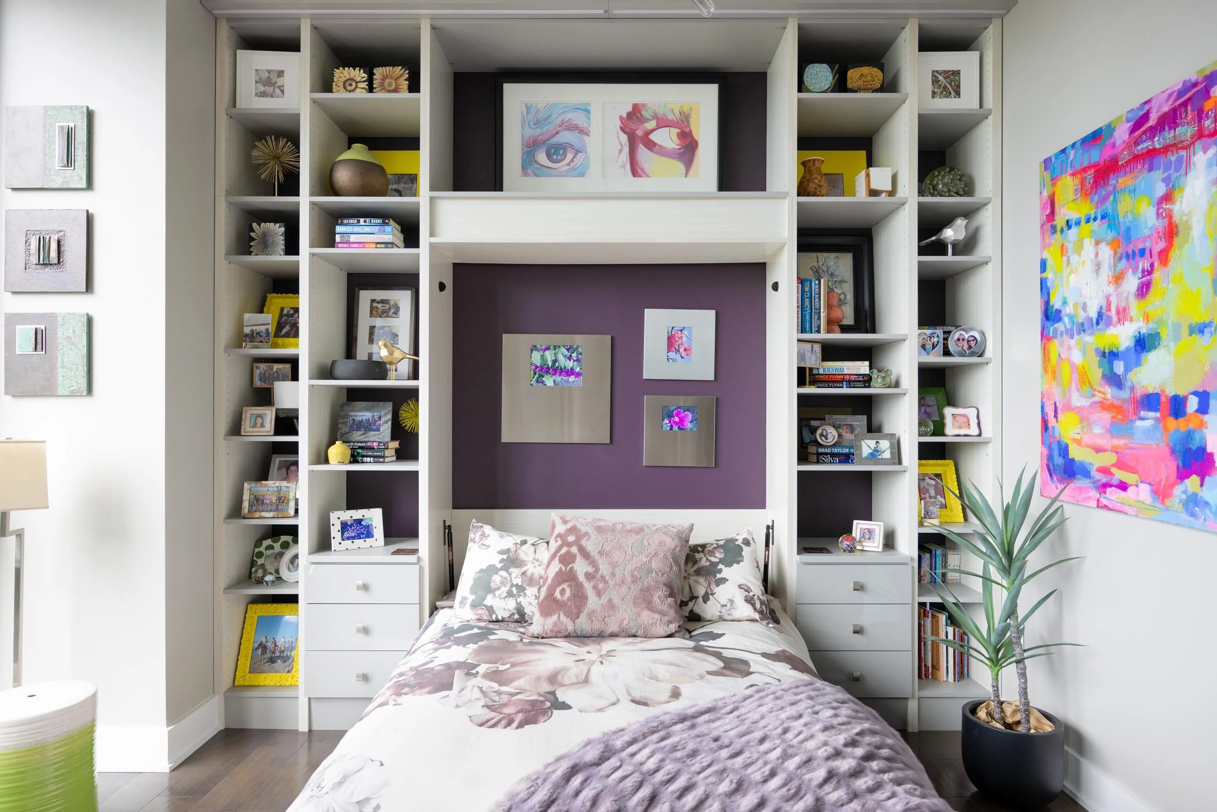 Custom white built-in bookshelf with custom made Murphy bed in Central Ohio.