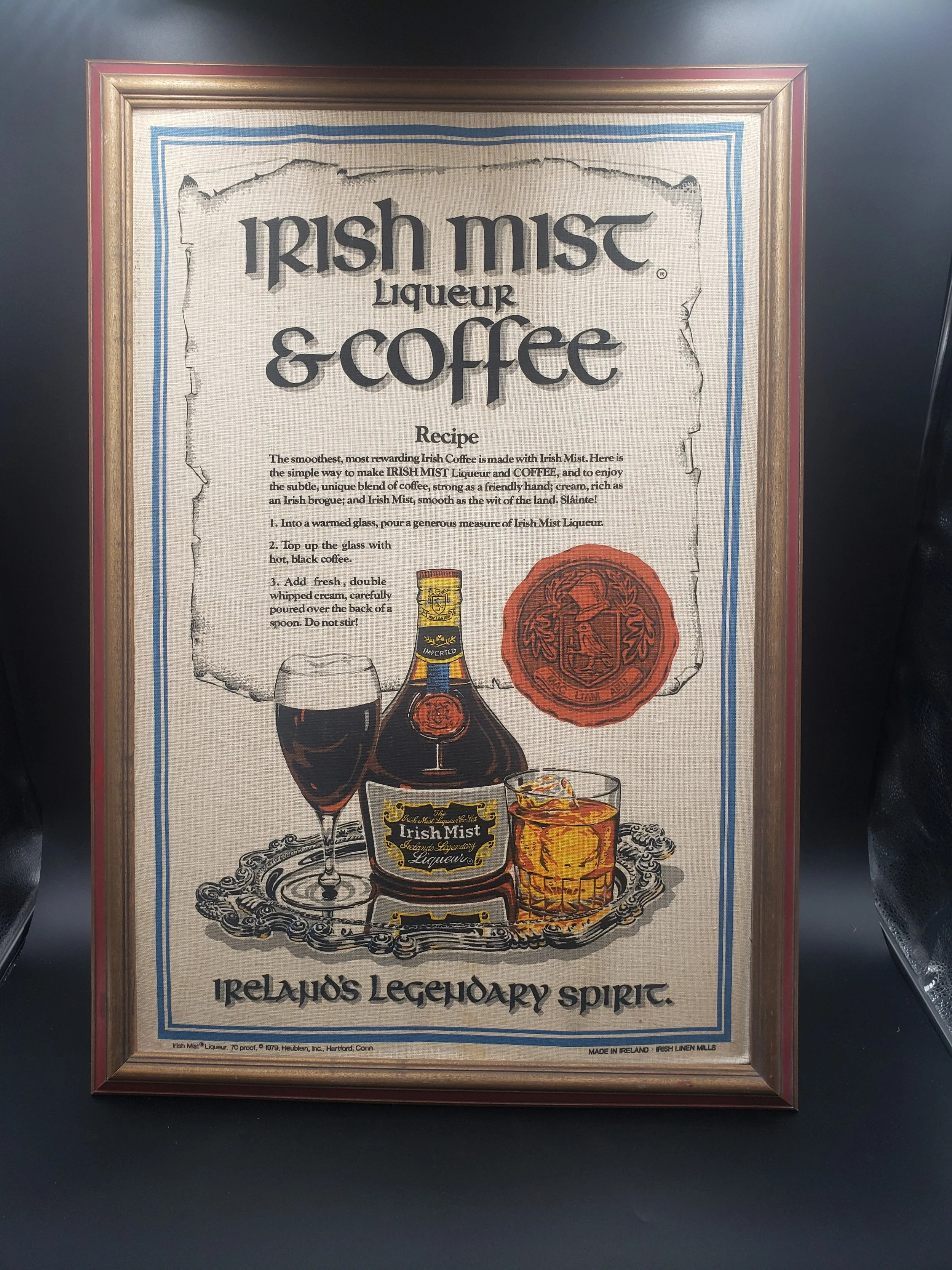 A poster advertising Irish Mist liqueur and coffee, with a drawing of the liqueur bottle, a glass of coffee, and a license seal, with instructions for making Irish Mist latte.