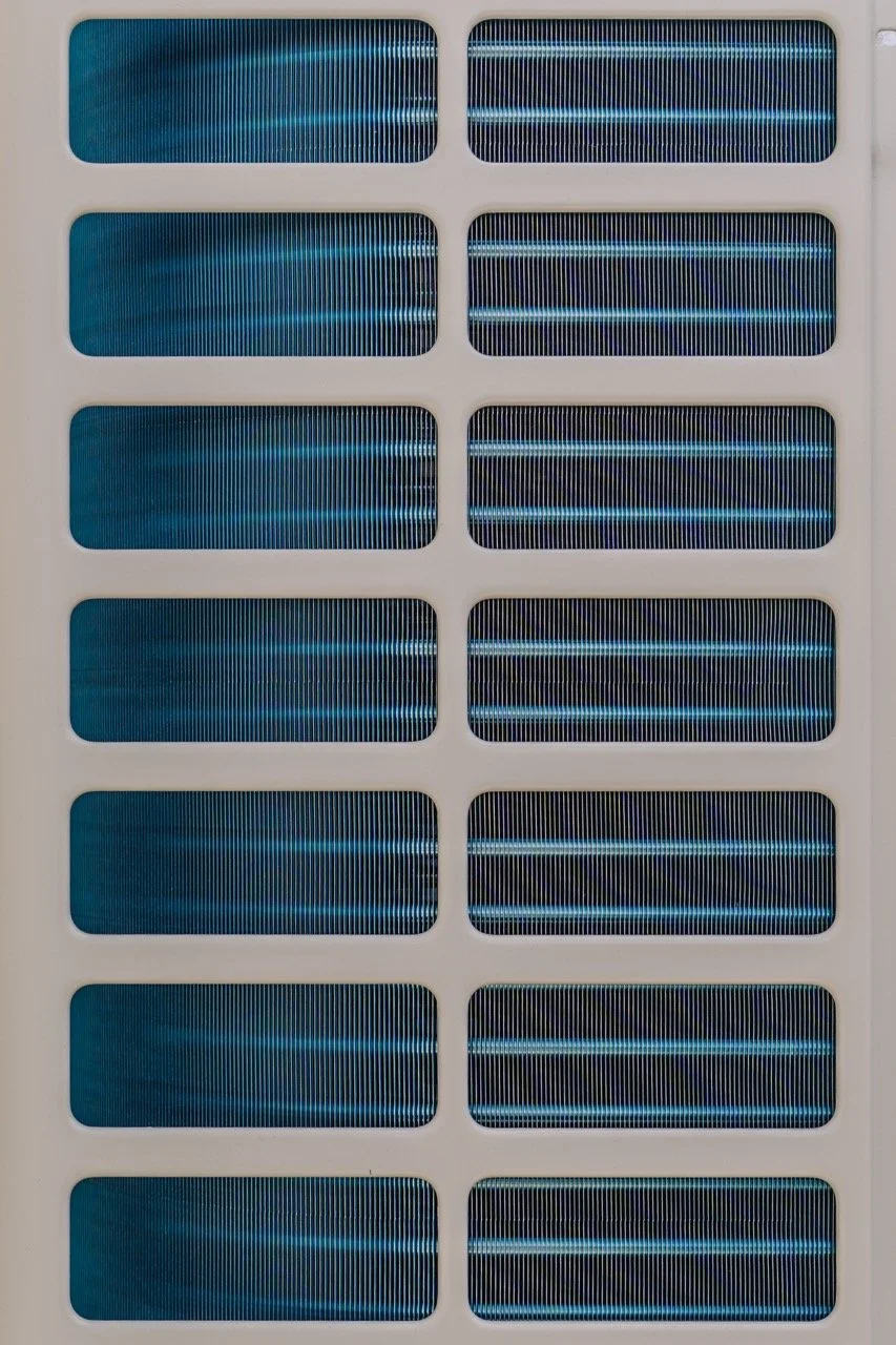 side grate of Econo air air conditioner blue metal with beige case