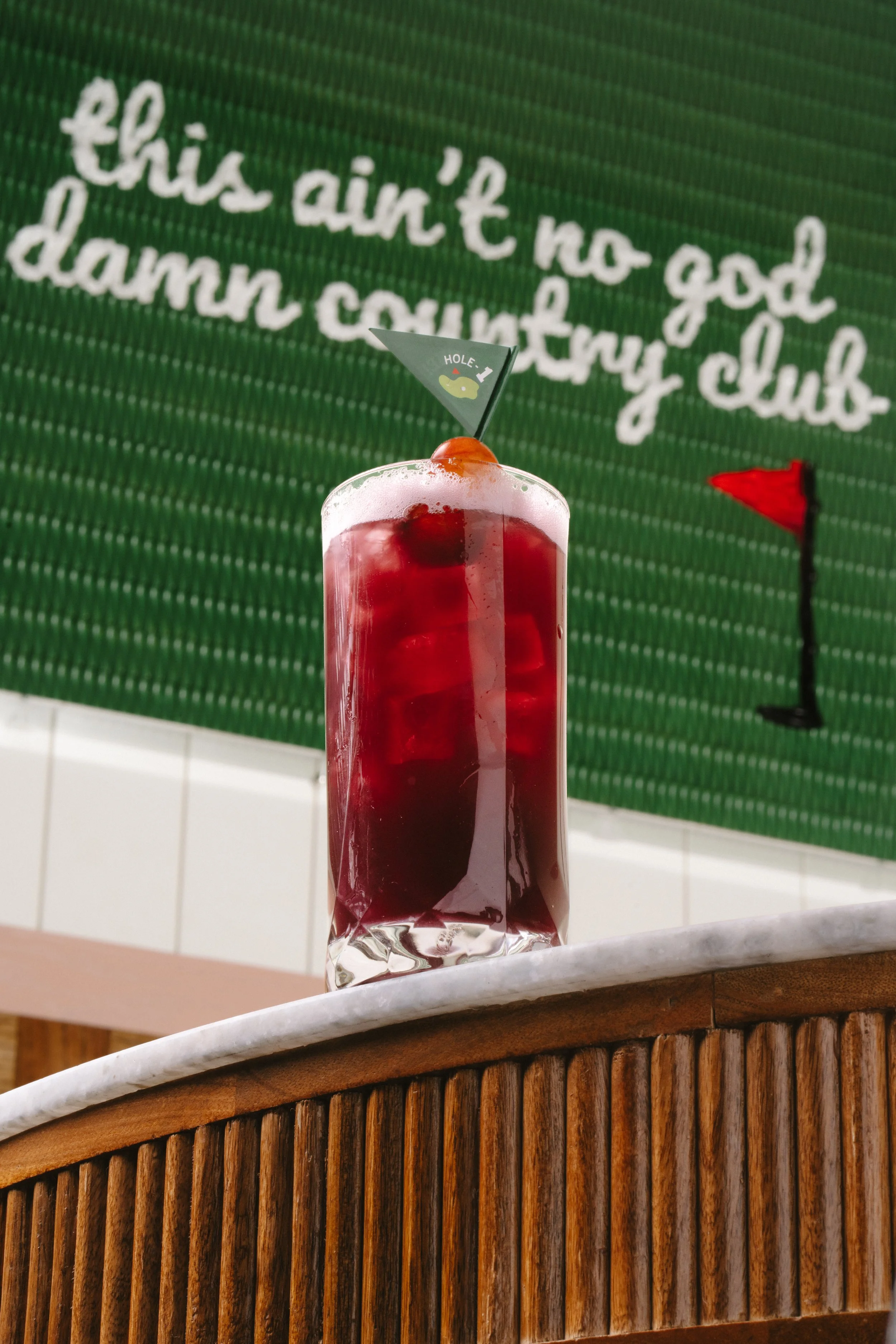 A martini cocktail with olives