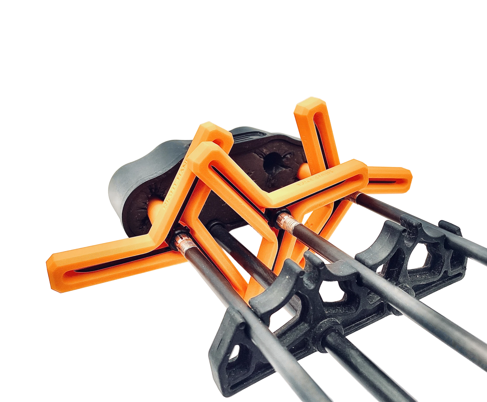 A slide roller used in pavement or asphalt work with orange and black parts.