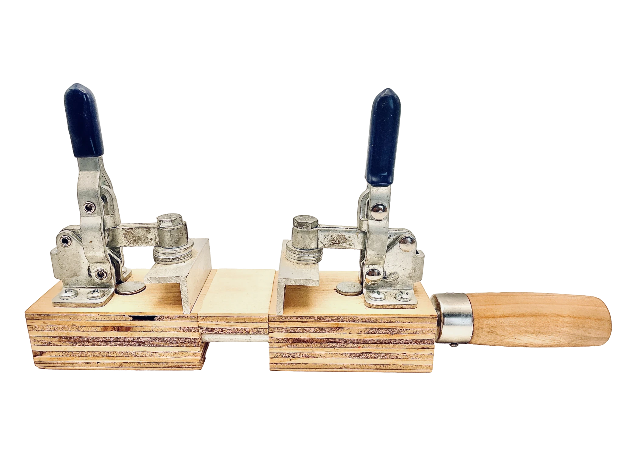 A vintage woodworking edge banding machine with metal clamps, a wooden base, and a wooden handle on the right side.