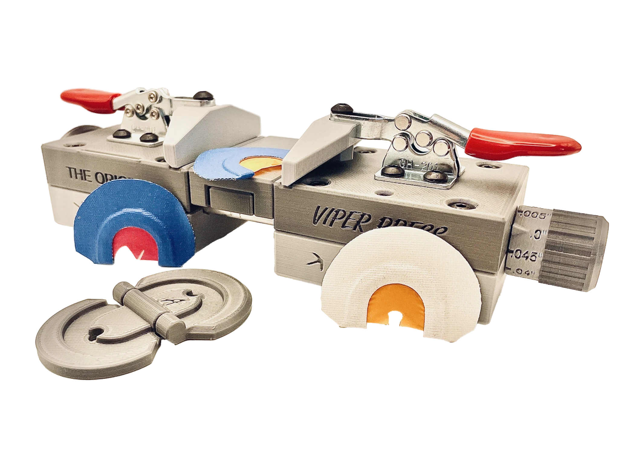 Close-up of a toy vintage bowling ball return machine with colorful bowling balls and pins.