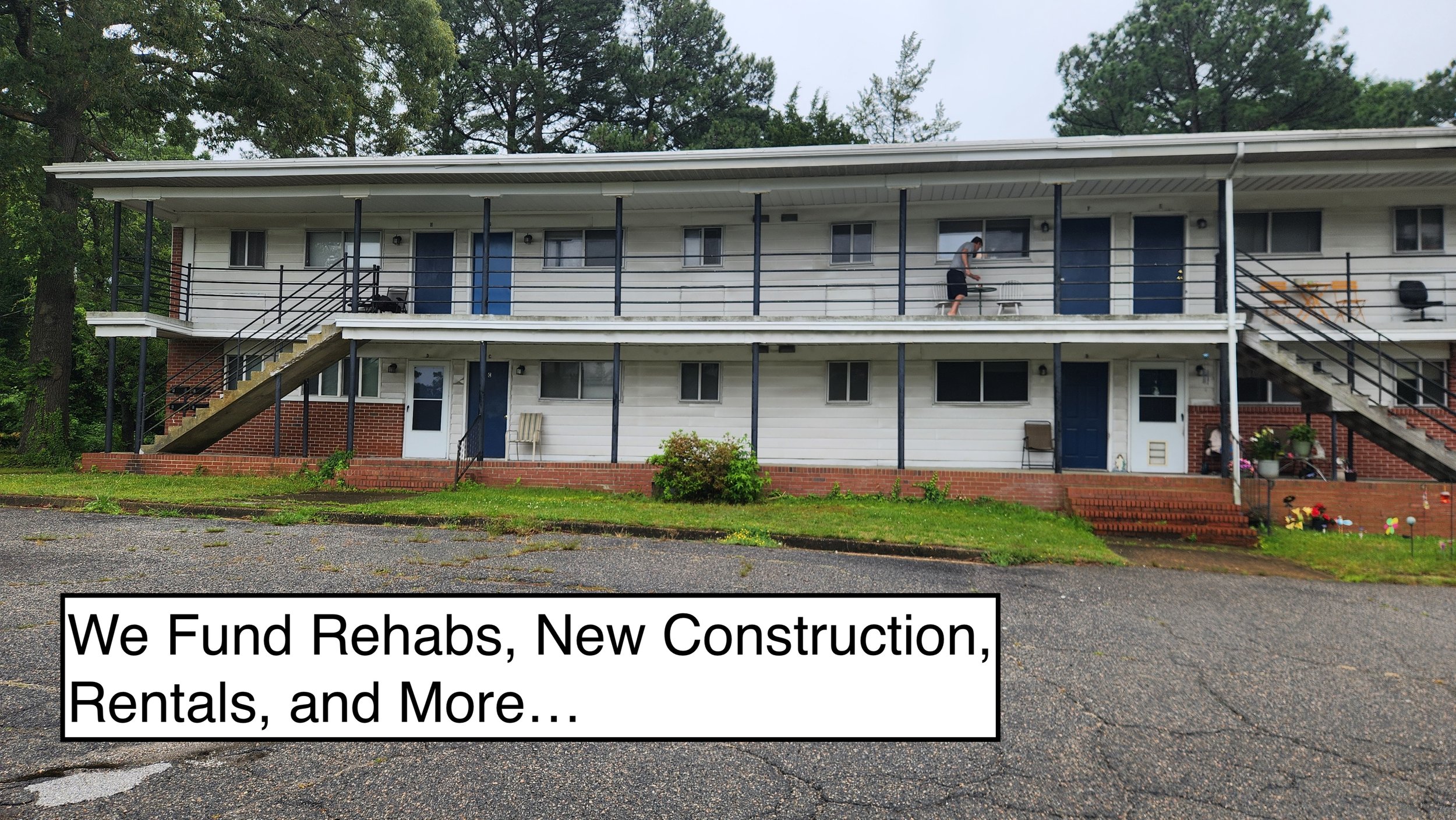 Two-story apartment building in need of renovations. The caption reads, "We Fund Rehabs, New Construction, Rentals, and More..."