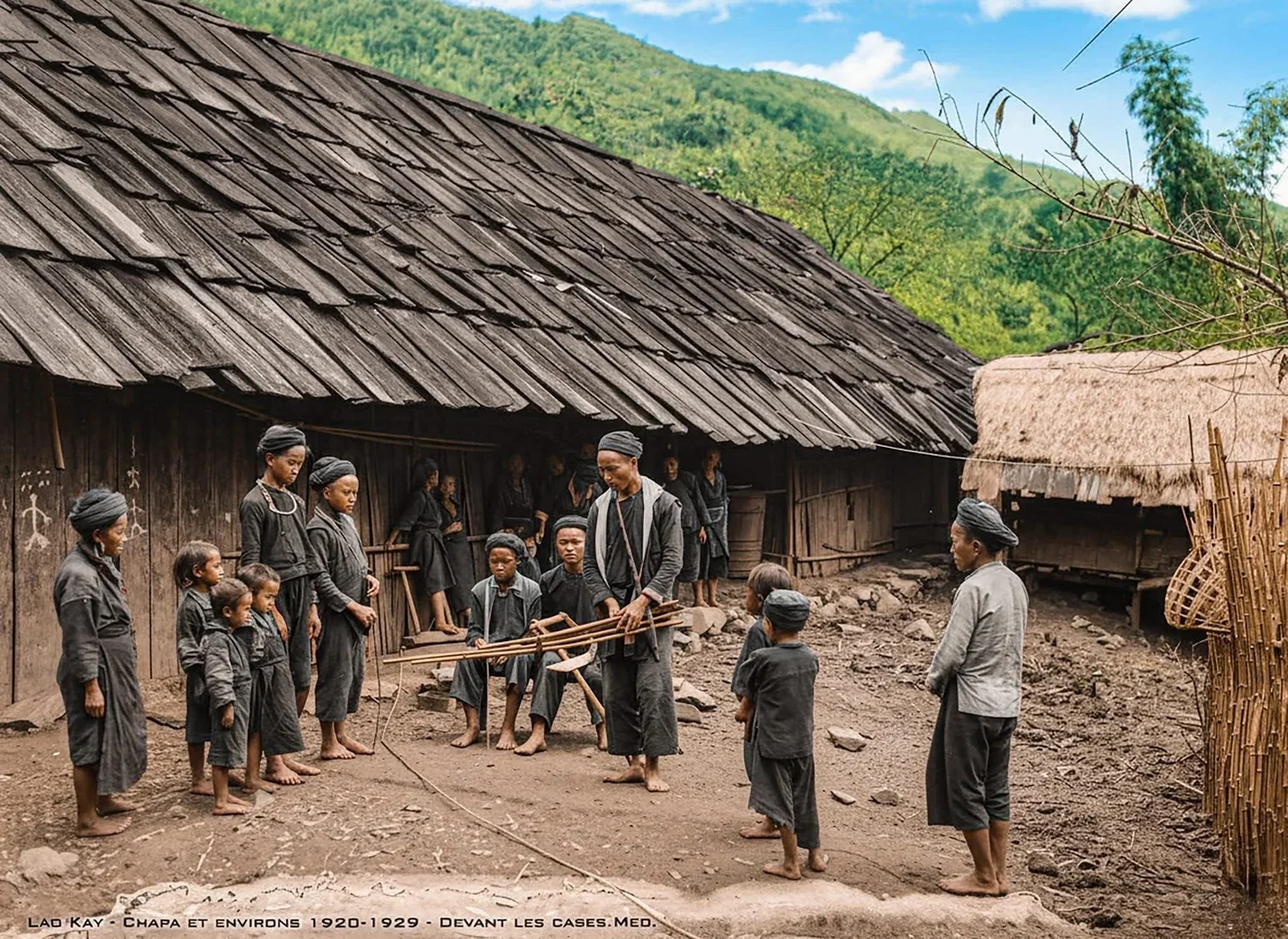 Recoloured historical photograph of a Hmong family standing outside a traditional wooden home in Sapa during the 1920s.