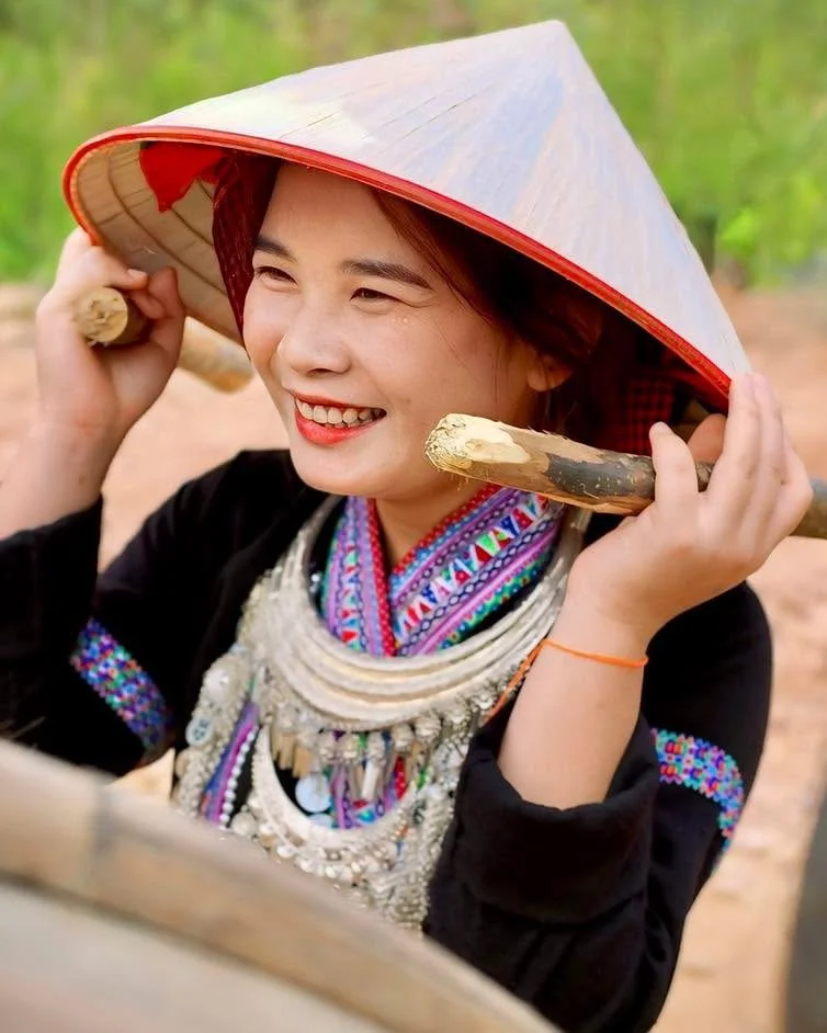Smiling Girl with Bamboo Flute