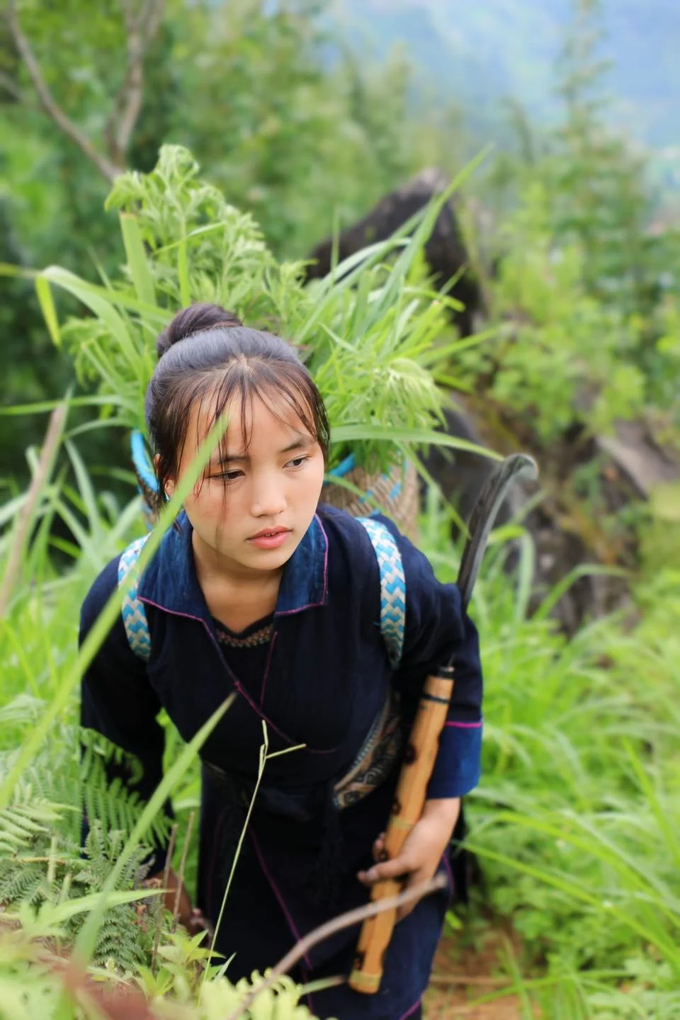 Girl Walking Through Mountain Vegetation