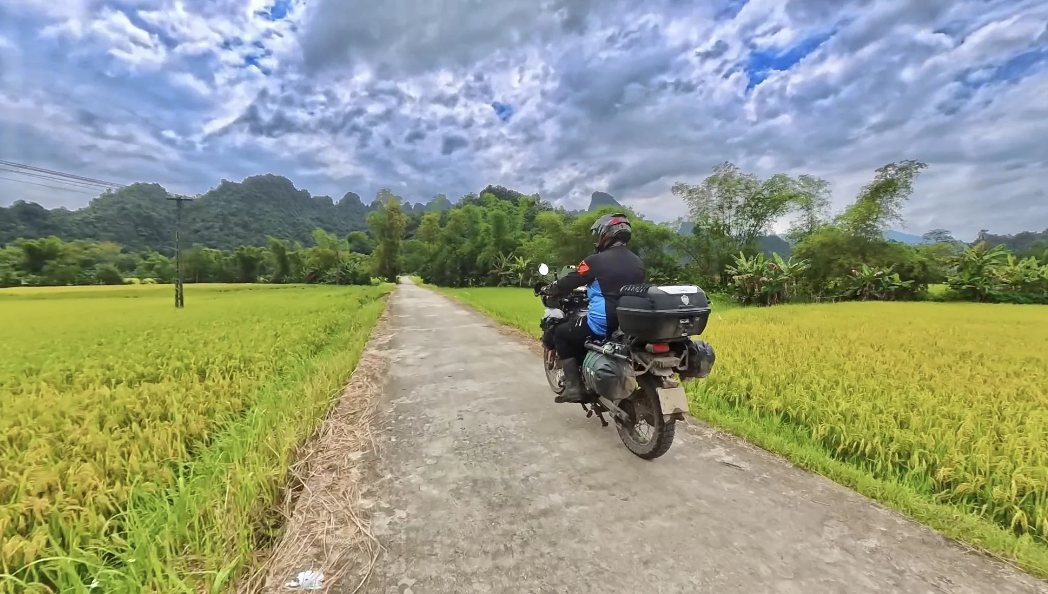Motorbiking Through Remote Rice Fields