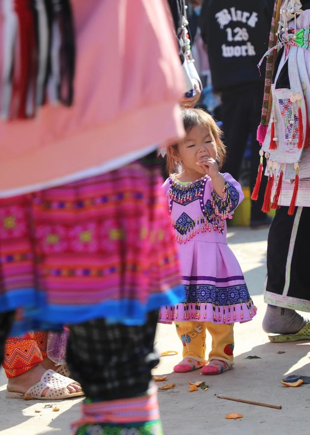  Little Girl in Pink at the Market