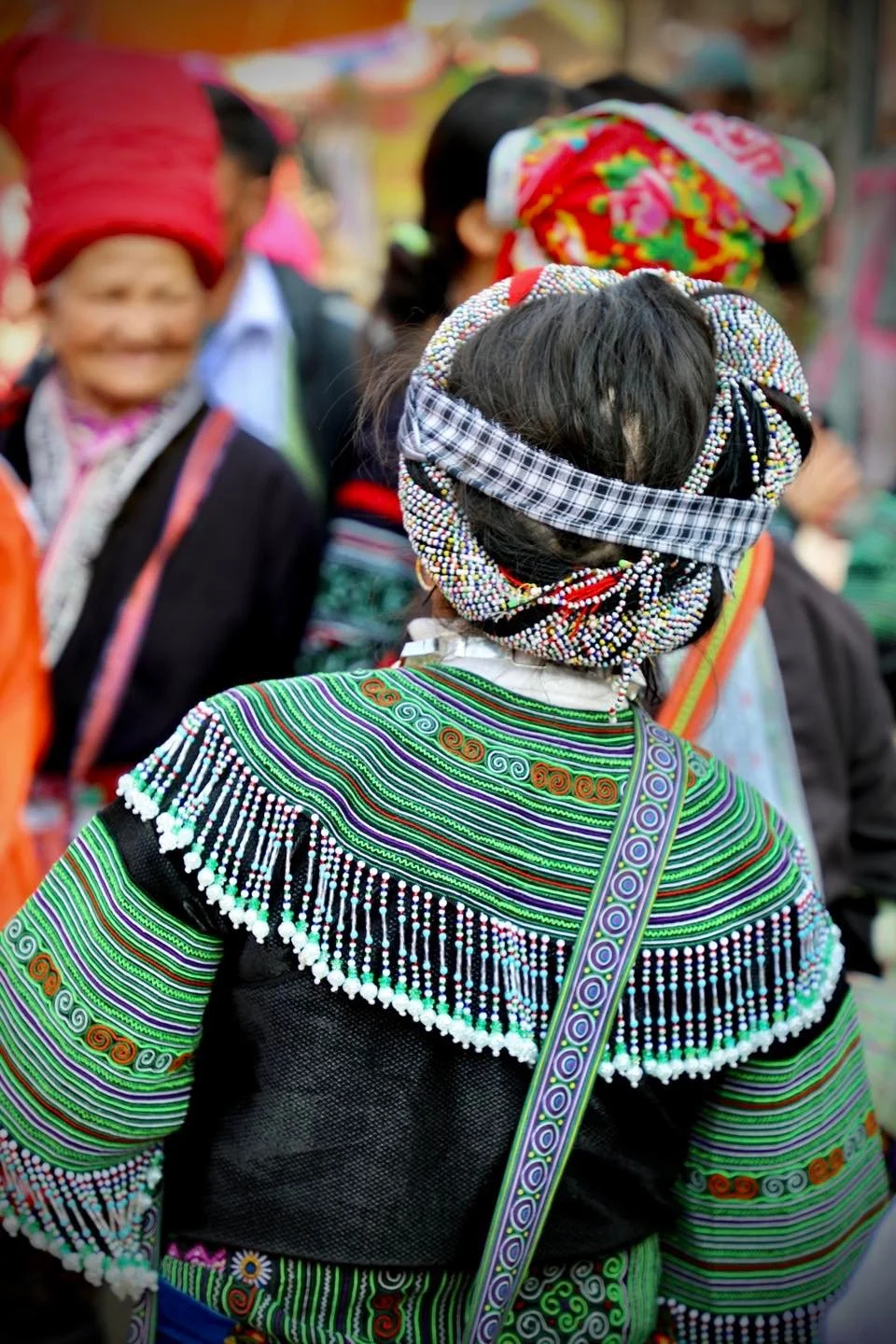  Woman in Green Embroidered Jacket