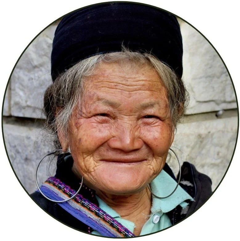 A Smile That Knows Far More Than It Says