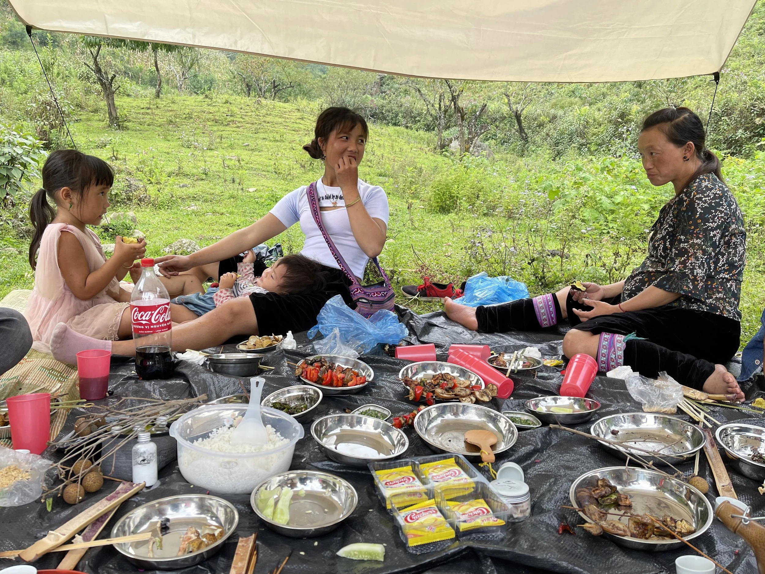 A local family enjoying a simple barbecue local food in the streams.