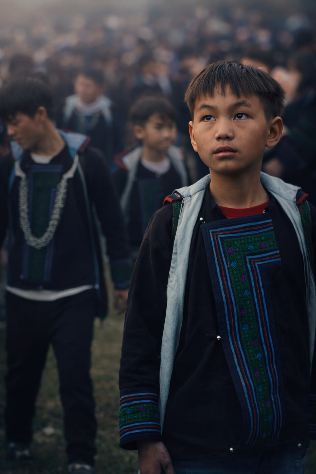 Portrait of young Hmong boys wearing traditional clothing in Sapa, northern Vietnam, photographed in 2026.
