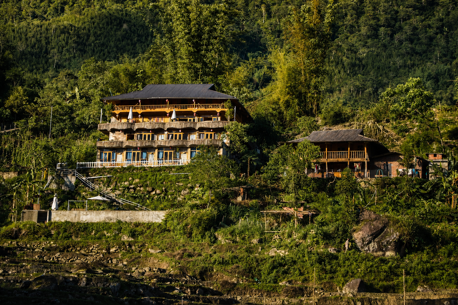 Hillside Vietnamese-owned homestay built above rice terraces in the Sapa region.