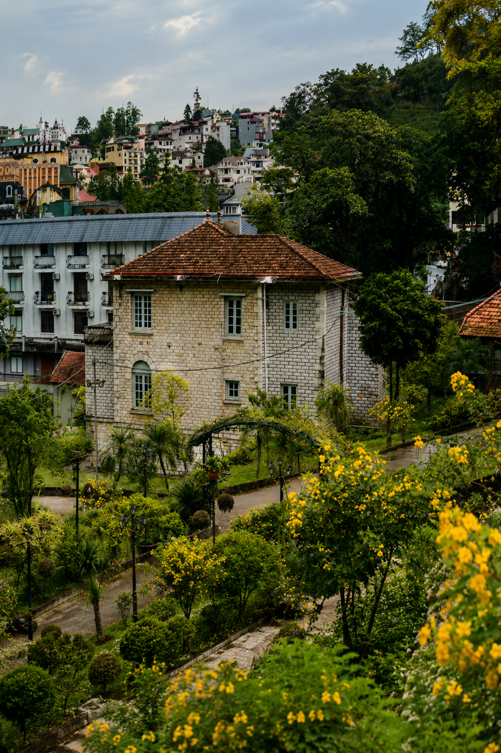 Photograph of a surviving French colonial villa surrounded by vegetation in Sapa, northern Vietnam, taken in 2026.