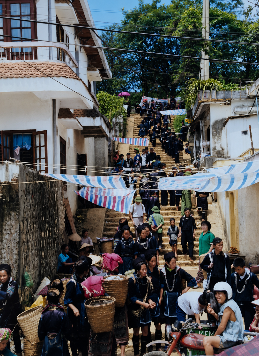 Busy market street filled with traders and shoppers during market day in Sapa, Vietnam, in 1998.