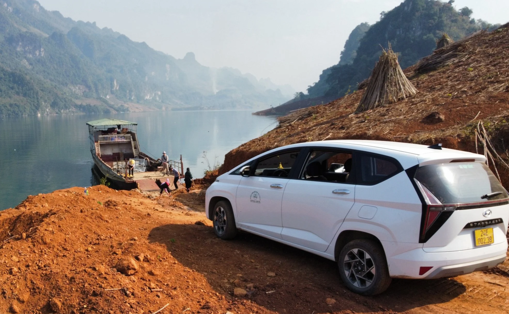 Car navigating rugged mountain road on the Northwest Loop in northern Vietnam