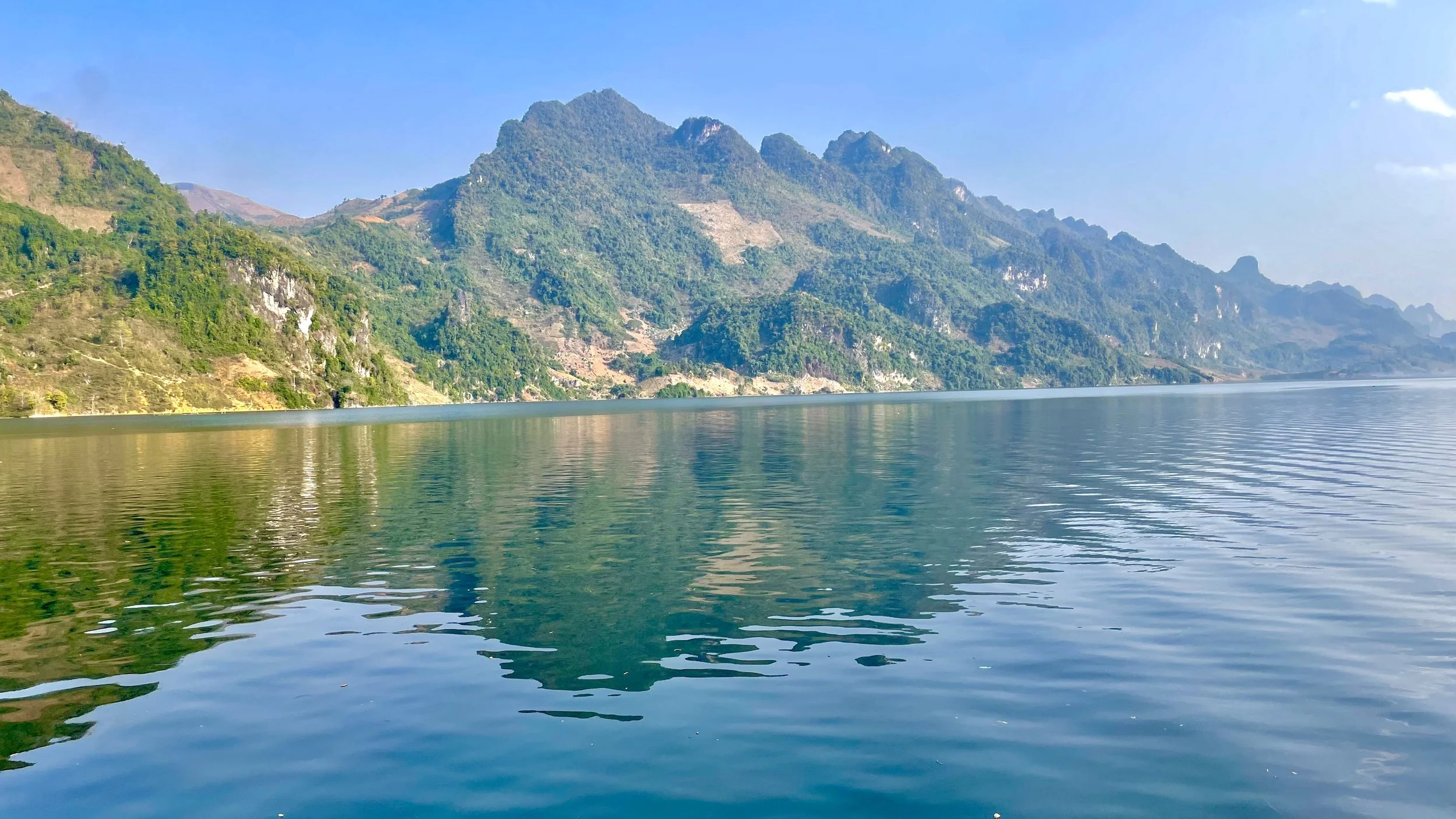 This slideshow portrays the Northwest Loop journey, offering a glimpse into the dramatic scenery and cultural encounters along the way. The images showcase mountain landscapes, winding roads, rivers and sunsets alongside scenes of local life, traditi
