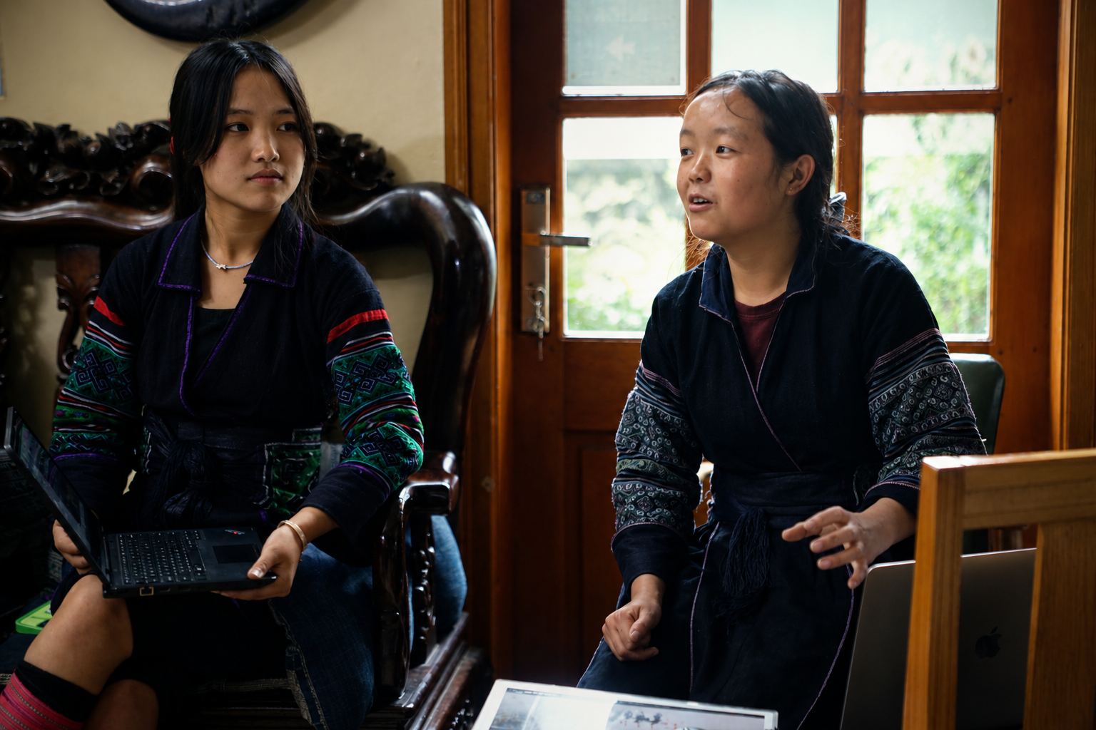 Two Hmong guides leading a food safety and cleanliness training session at the ETHOS Community Centre in Sapa.