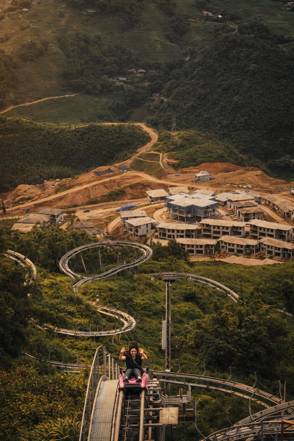 Mountain resort and winding cable car track at Fansipan area in Sapa viewed from above
