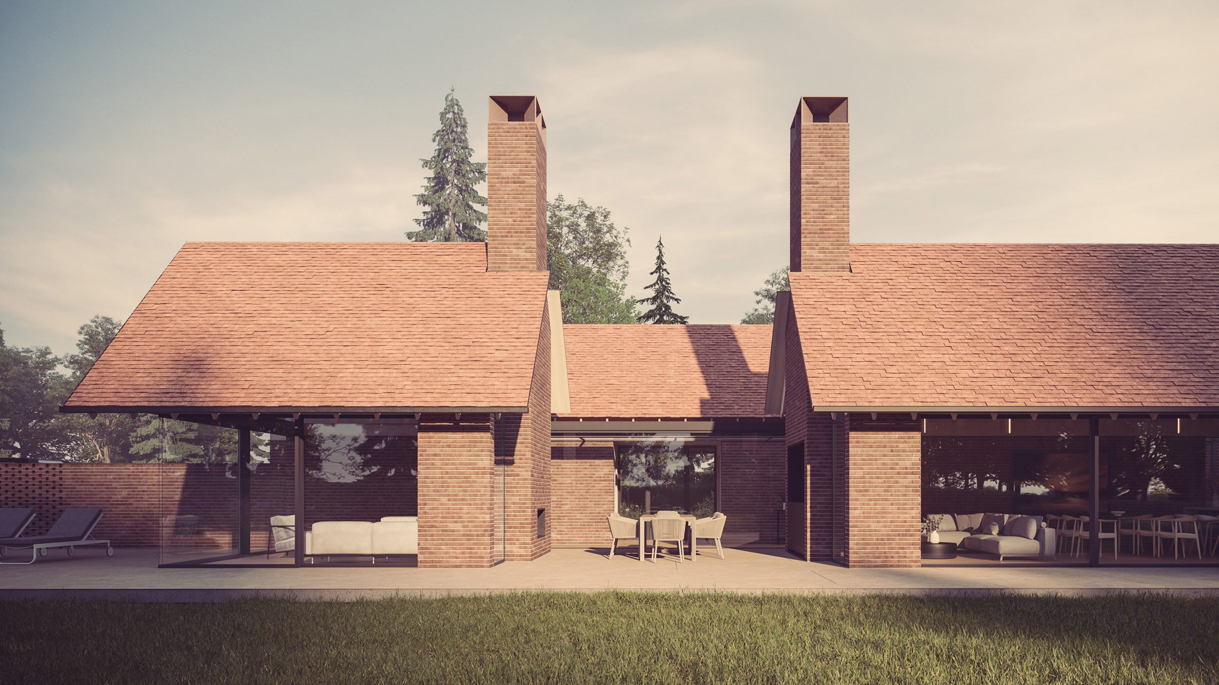 Modern house with brick exterior, large glass windows, and outdoor furniture including lounge chairs and a dining set in a grassy yard with trees in the background.