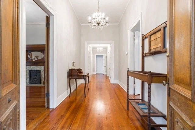 Professional real estate photography of an elegant classic home hallway in Ottawa by Charmcam.