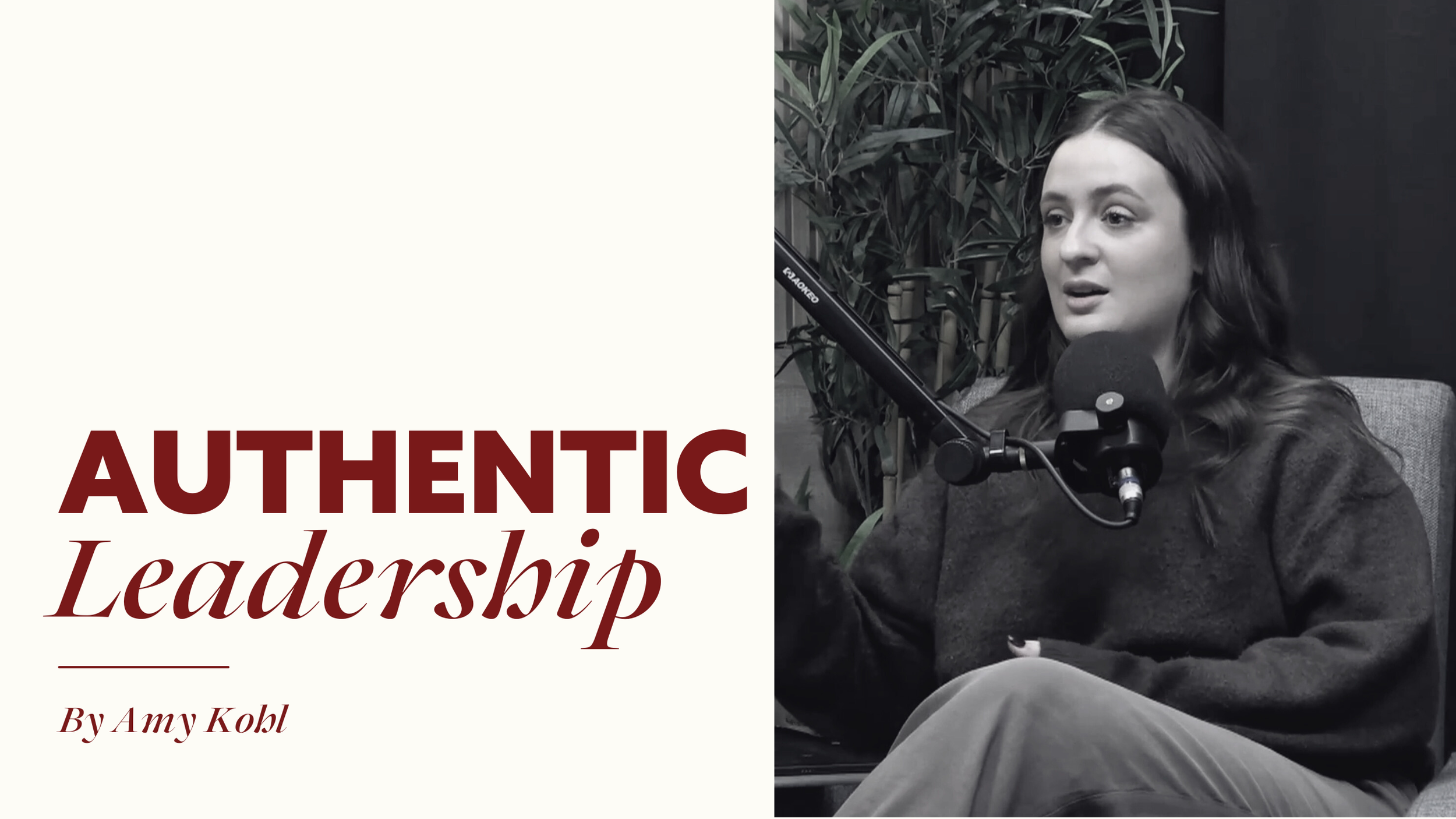 A woman with long wavy hair speaking into a microphone during an interview or podcast, sitting on a chair with plants in the background.