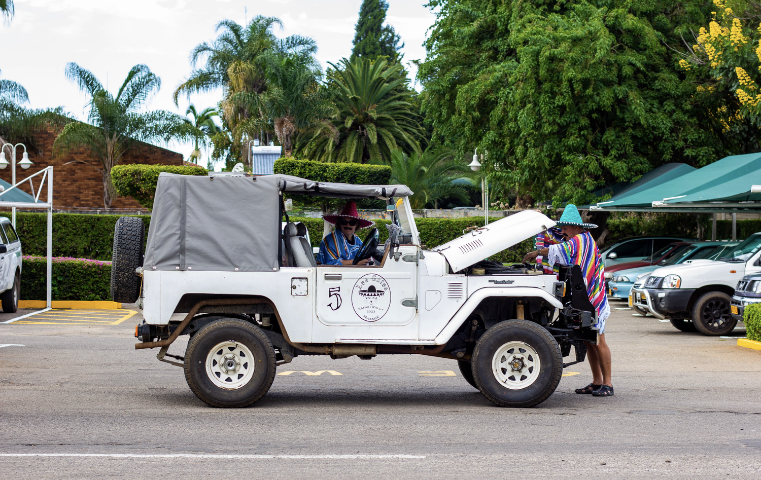 Safari Rally vehicle and participants