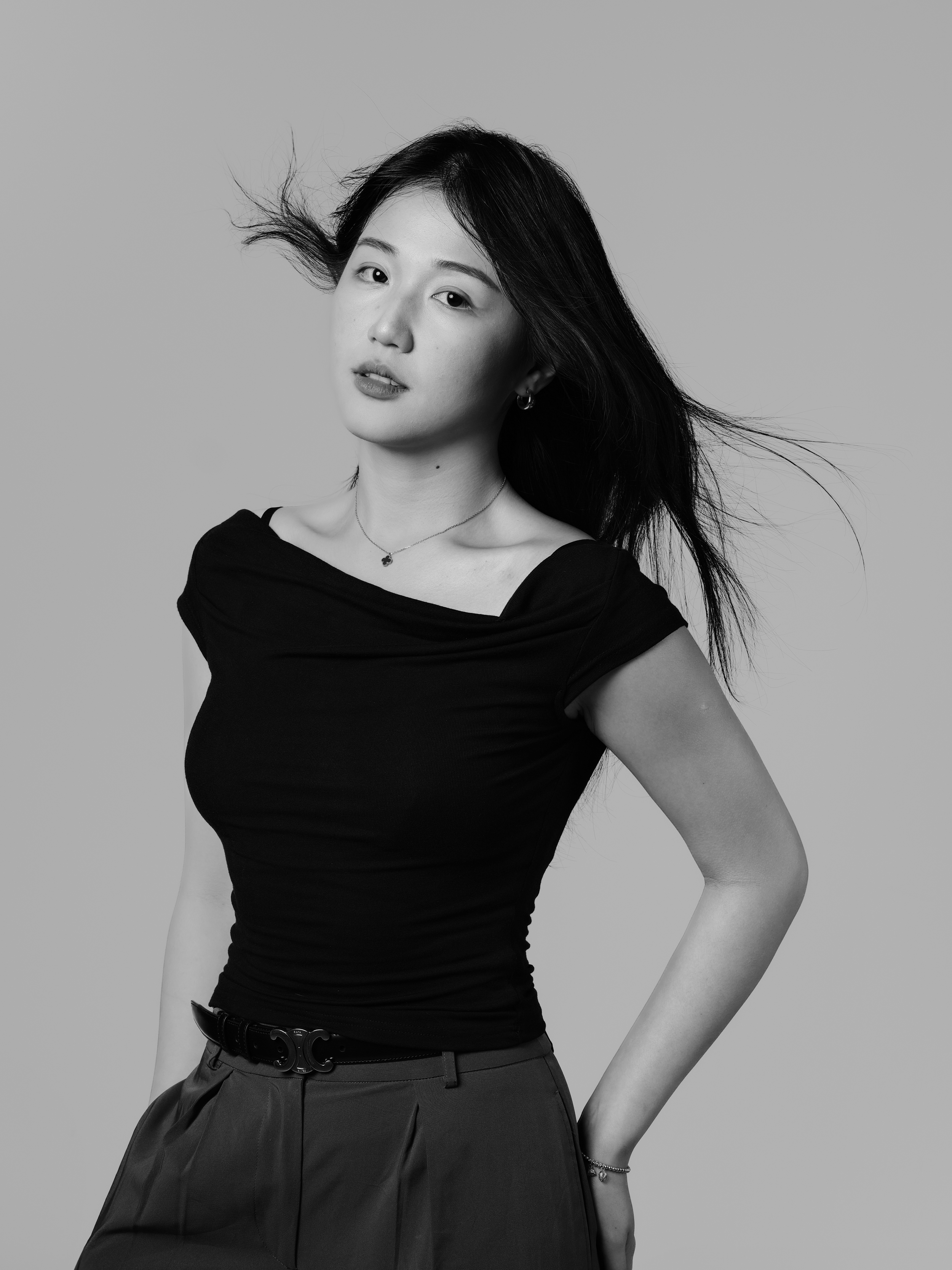 Doris Tan, Brand Designer at ZOOM-ZOOM MEDIA Sydney, specializing in visual identity, logo design, UI/UX for websites, and high-end print collateral to elevate brand aesthetics.