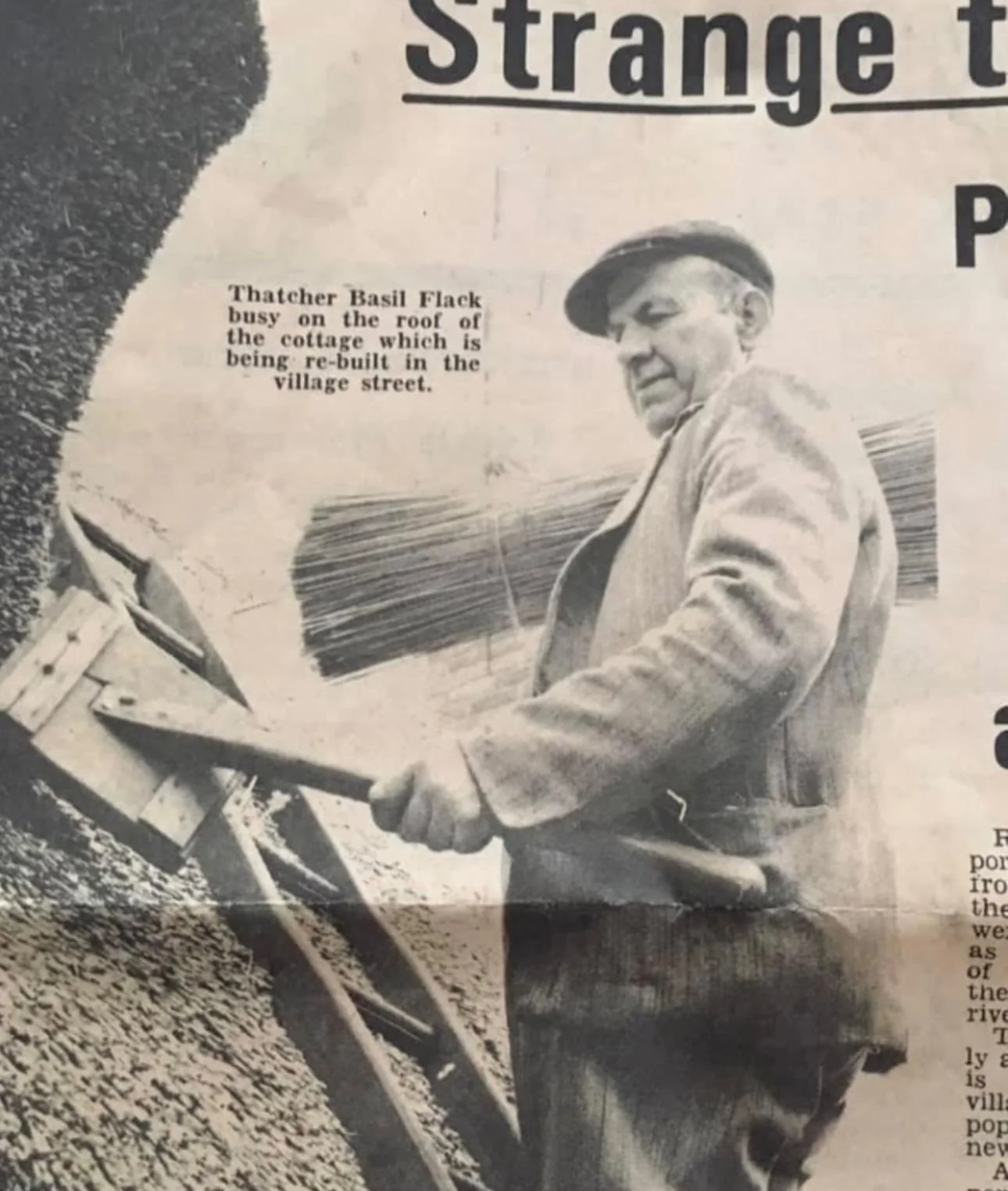 A black and white photograph of Thatcher Basil Flack working on a roof, with a caption noting he is busy on the roof of a cottage being rebuilt in a village street.