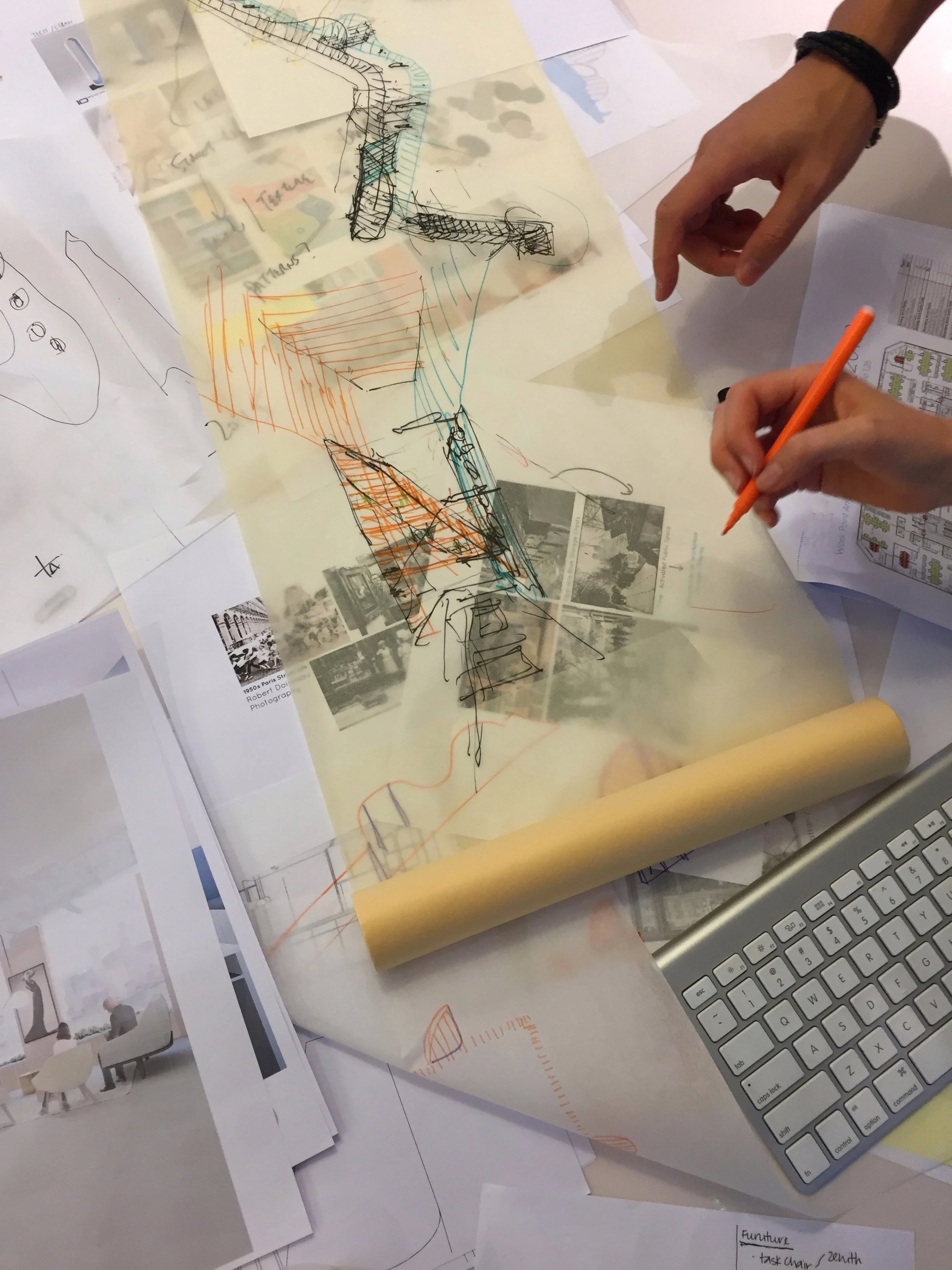 Top view of sketching on yellow trace paper.