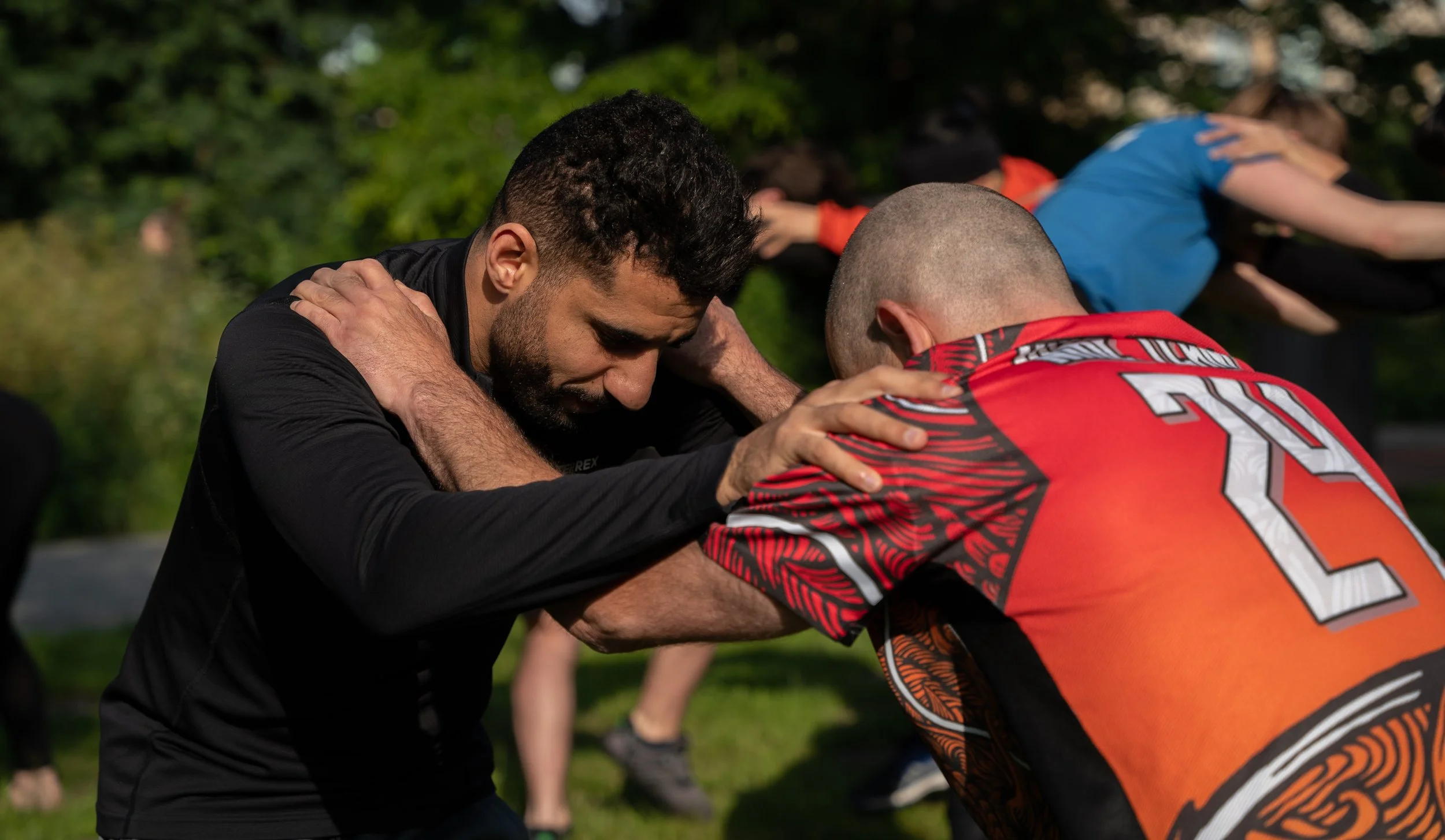 A calisthenics group training at rembrandtpark in amsterdam west