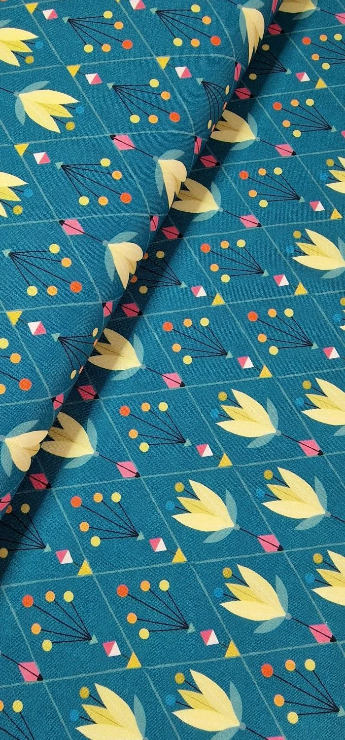 Dashwood Tree of Life cotton fabric with tulips on teal blue.