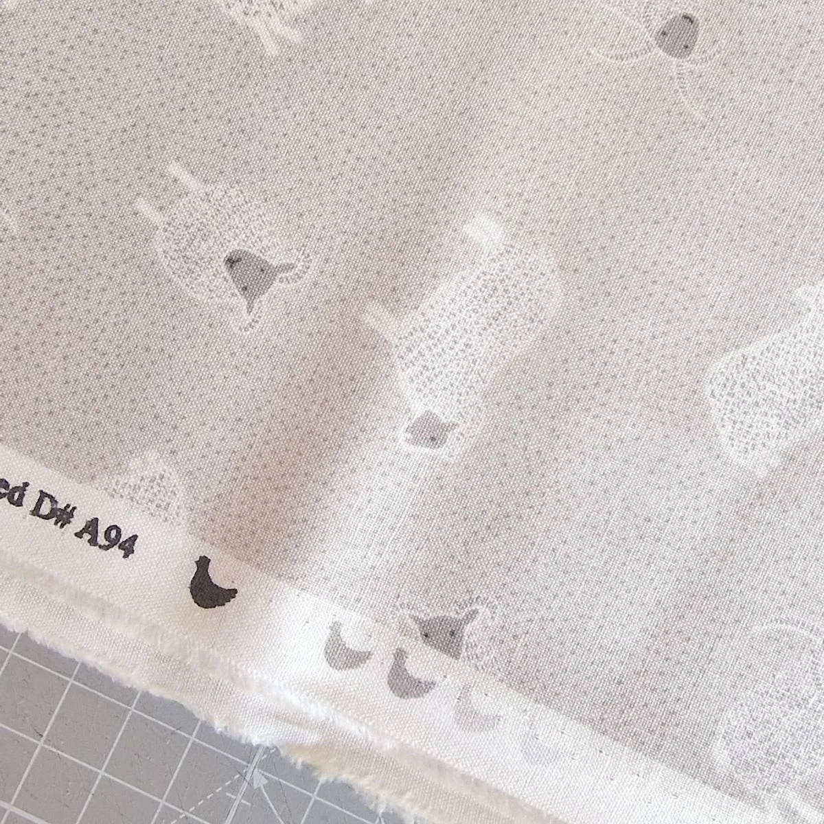 Look at dark cream fabric with tiny dots and little sheep - Lewis and Irene, Country Life collection