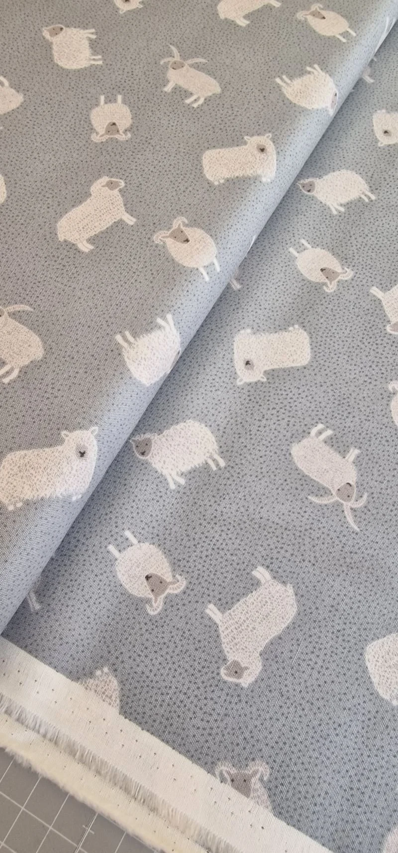 Look at Lewis and Irene pure cotton, quilting fabric in grey blue colour with farm animals print