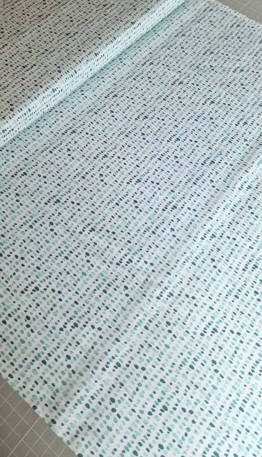 Aqua blue dashes on white background