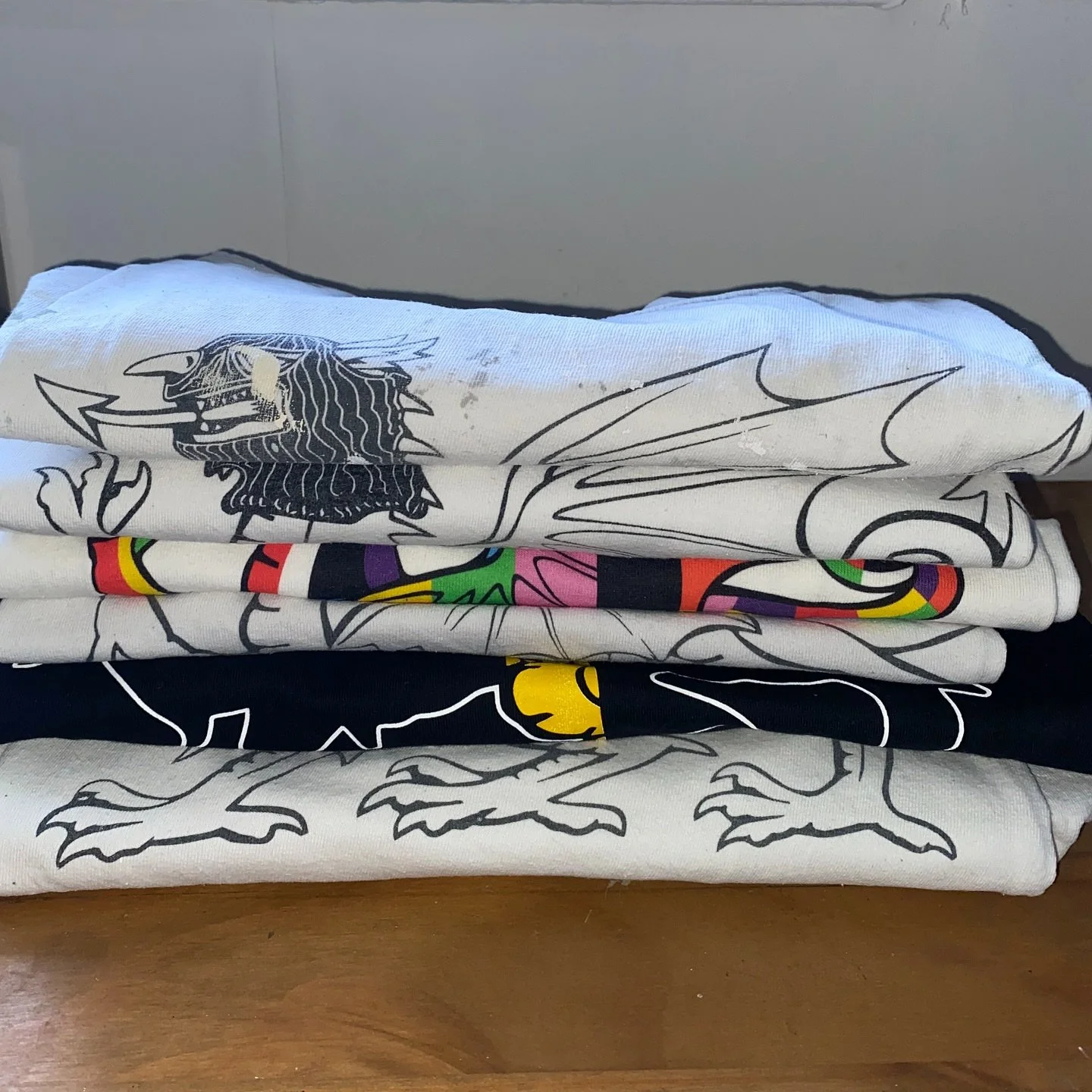 Starting to notice a funny pattern with some of my painting T-shirts