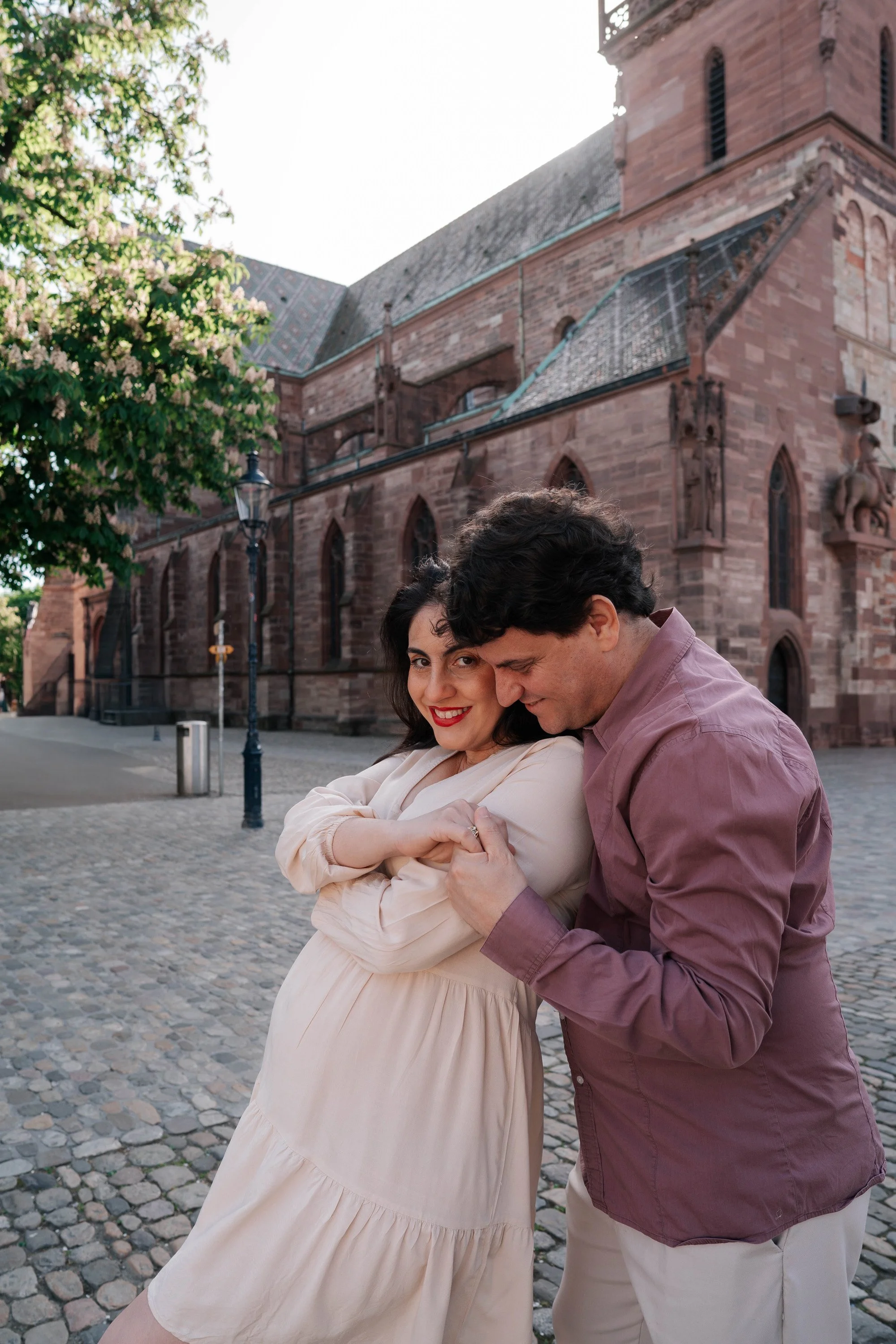 Couple Romantic Photoshoot in Basel, Switzerland, in front of Cathedral