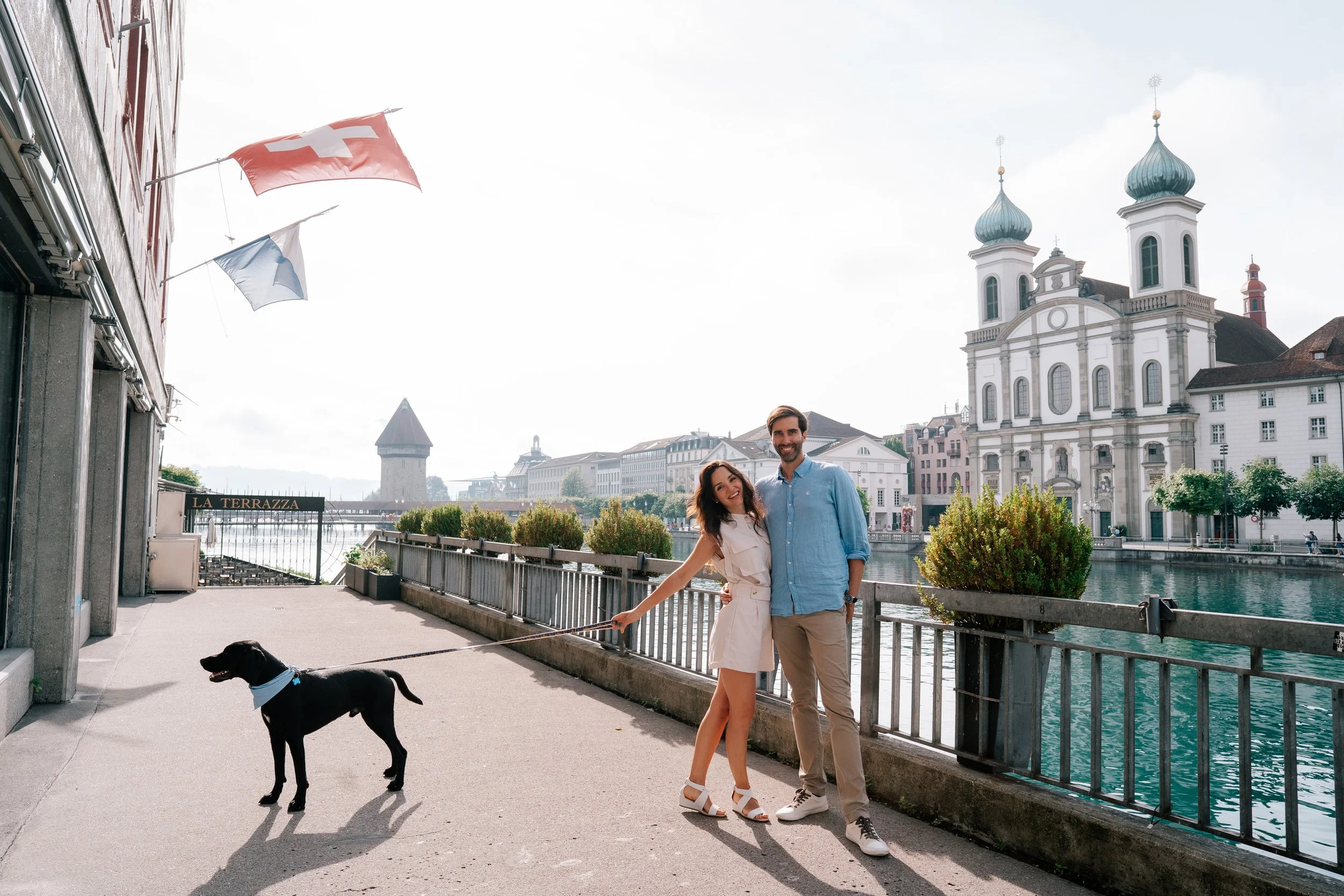Couple and Dog by Lucerne’s River | Switzerland Vacation Photoshoot