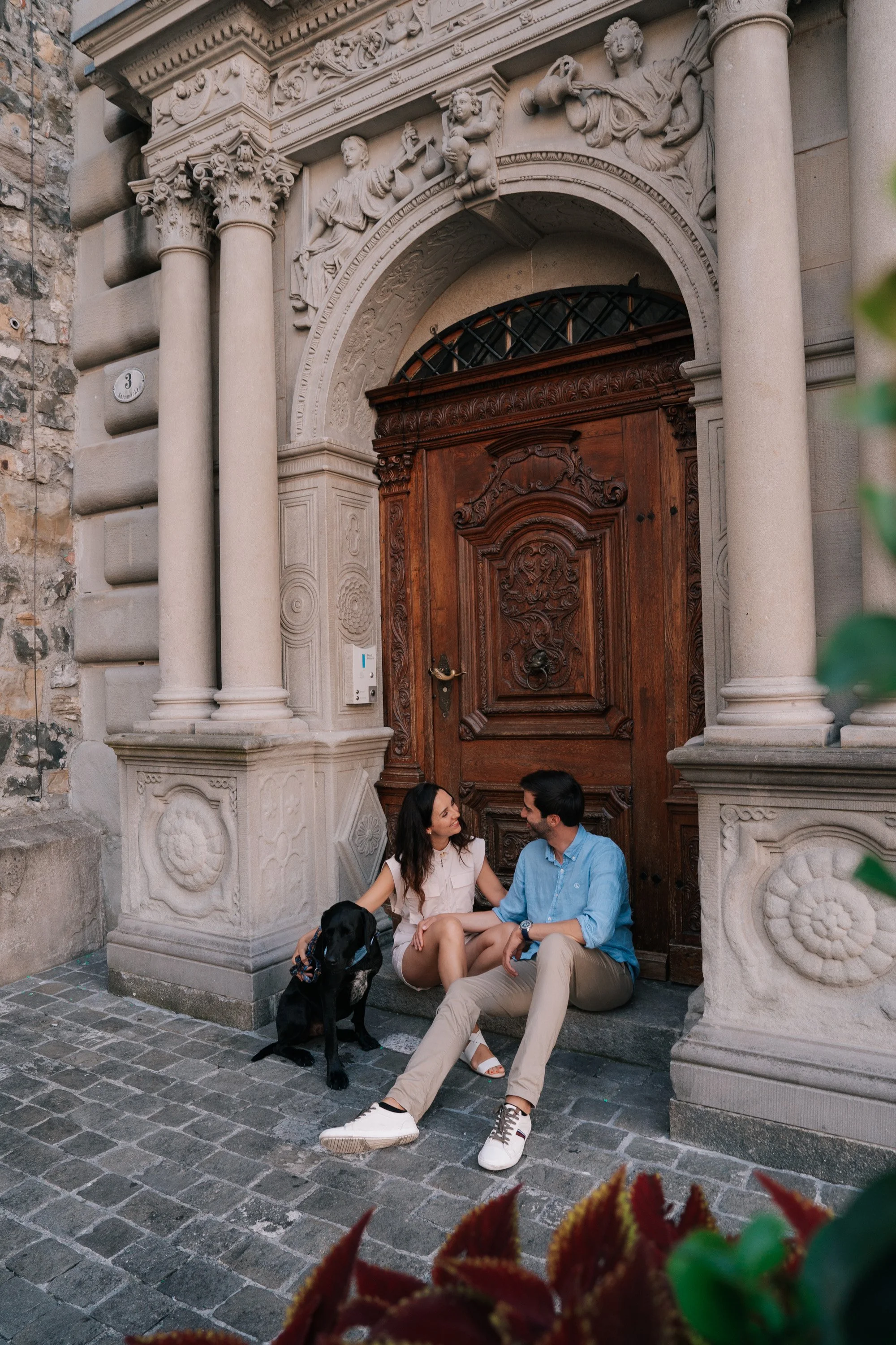 Lucerne Couple and Dog by Historic Gate | Switzerland Vacation Photos