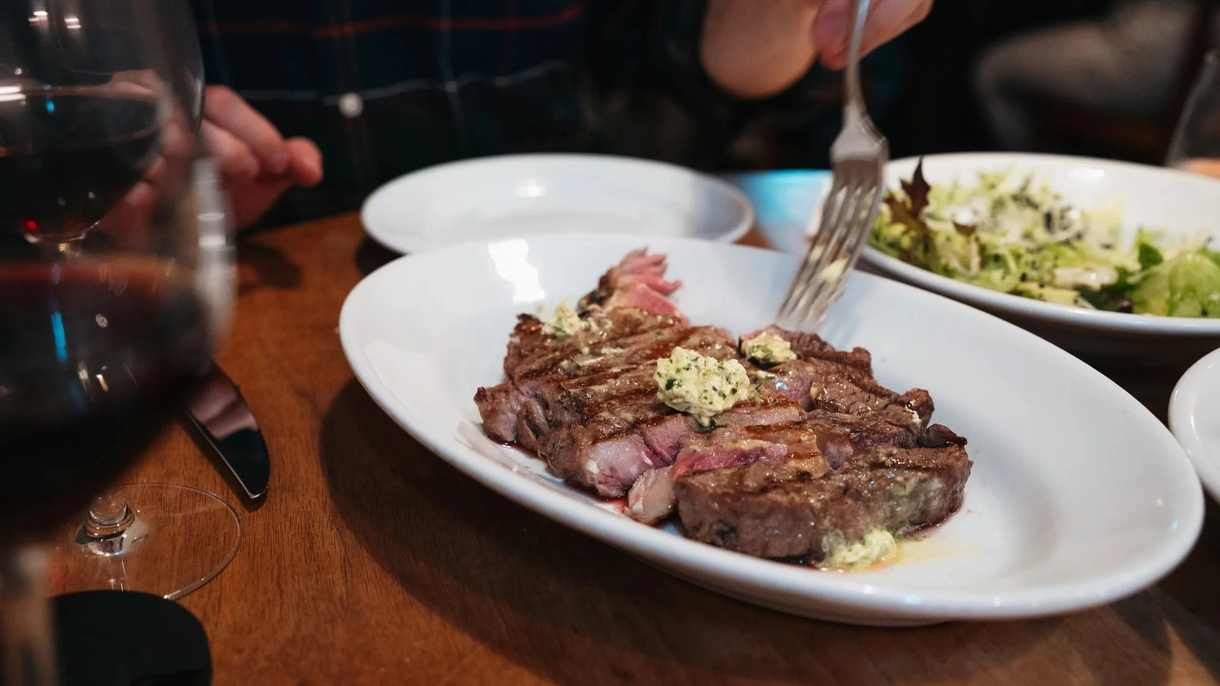 Beef rib eye steak in dinner restaurant Lotti in Zurich, Switzerland.