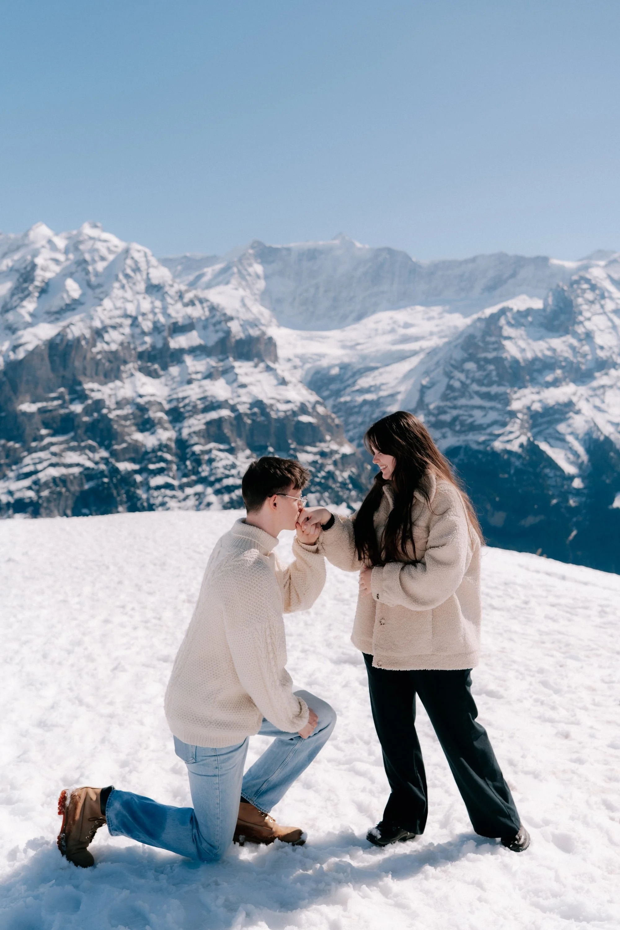 snowy-surprise-proposal-switzerland-grindelwald-alex-bekah.jpg