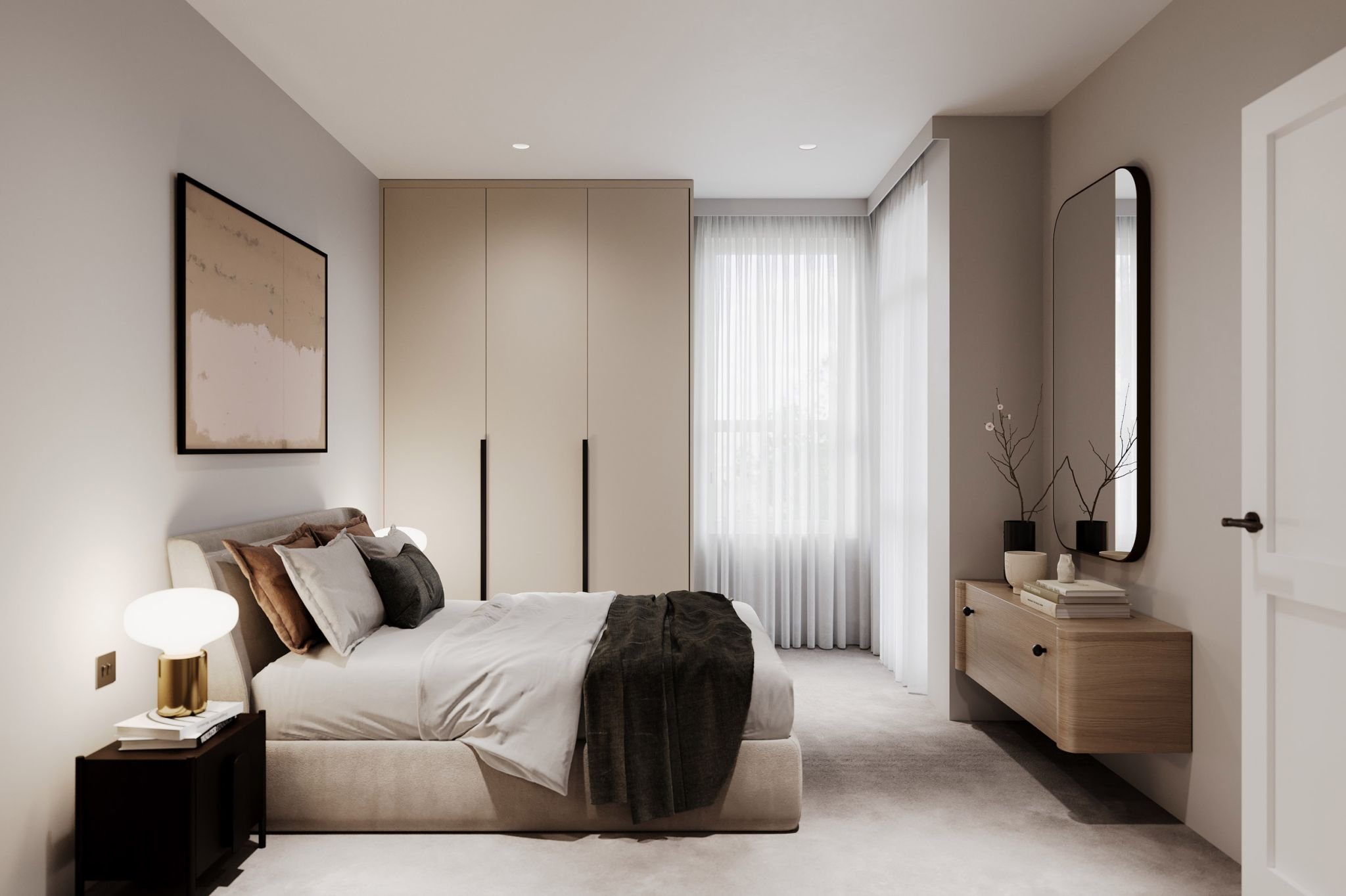 Modern bedroom with beige plush bed, dark pillows, white and brown bedding, beside a black nightstand with a lamp, cream-colored cabinetry, sheer curtains, wall mirror, and decorative vases and books.