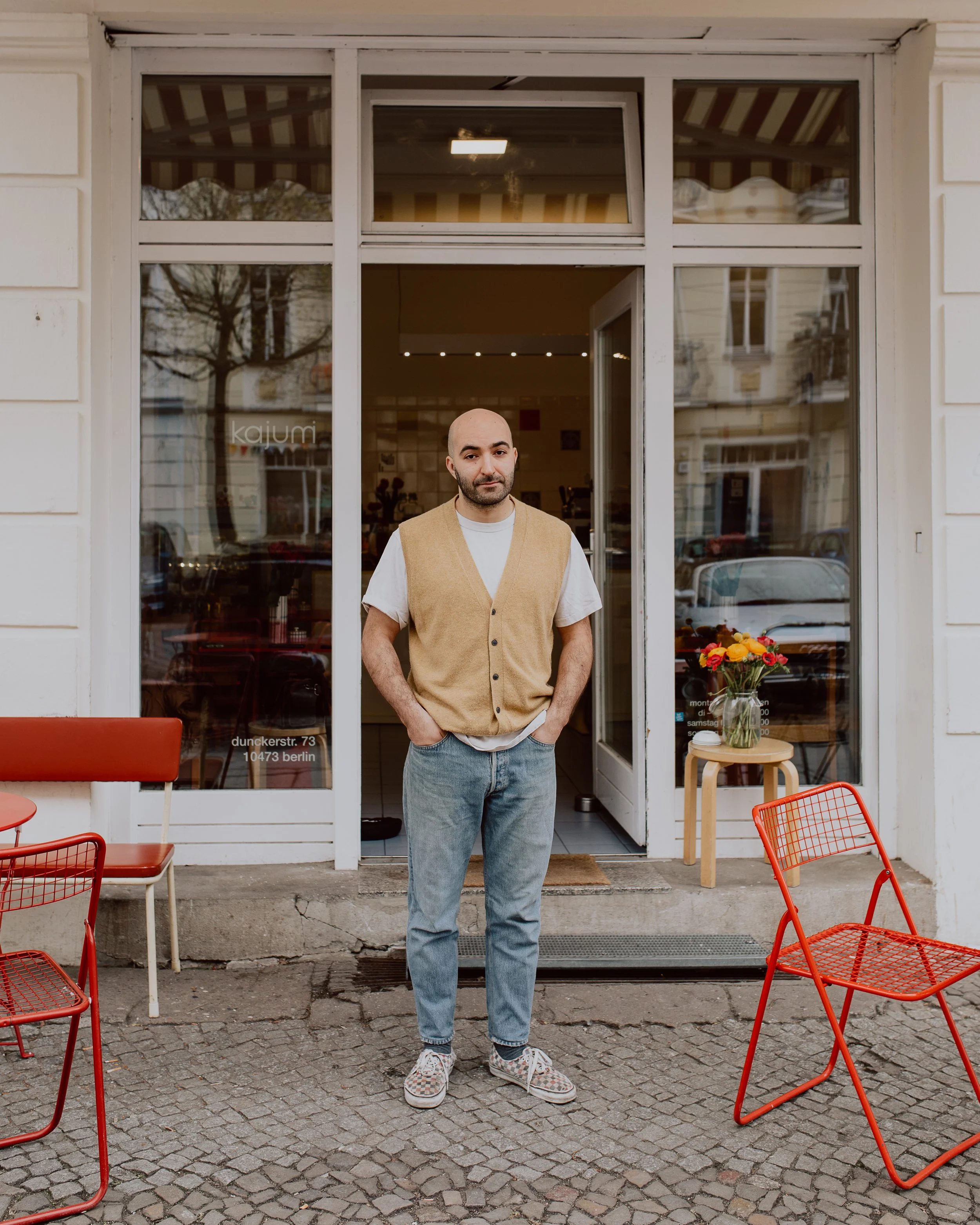 cafe-kajumi-berlin-owner-ebrahim-in-front-of-cafe.jpg